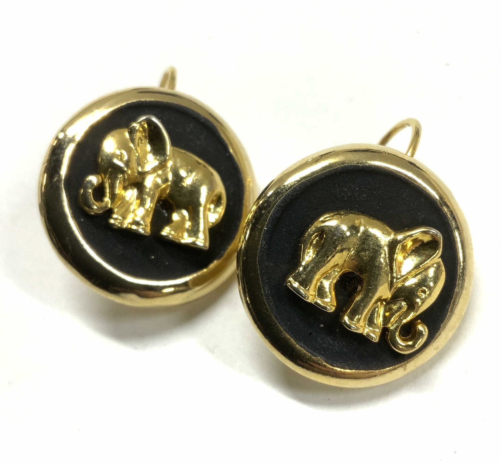 Gold tone Elephant Motif Lever Back Earrings: Lever Back cocktail earrings , gold tone and black with center god tone elephant figurine , drop is 1 in. 3/4 in. Wide. Earrings, elephant motif drop earrings, gold tone jewelry Chunky jewelry, statem