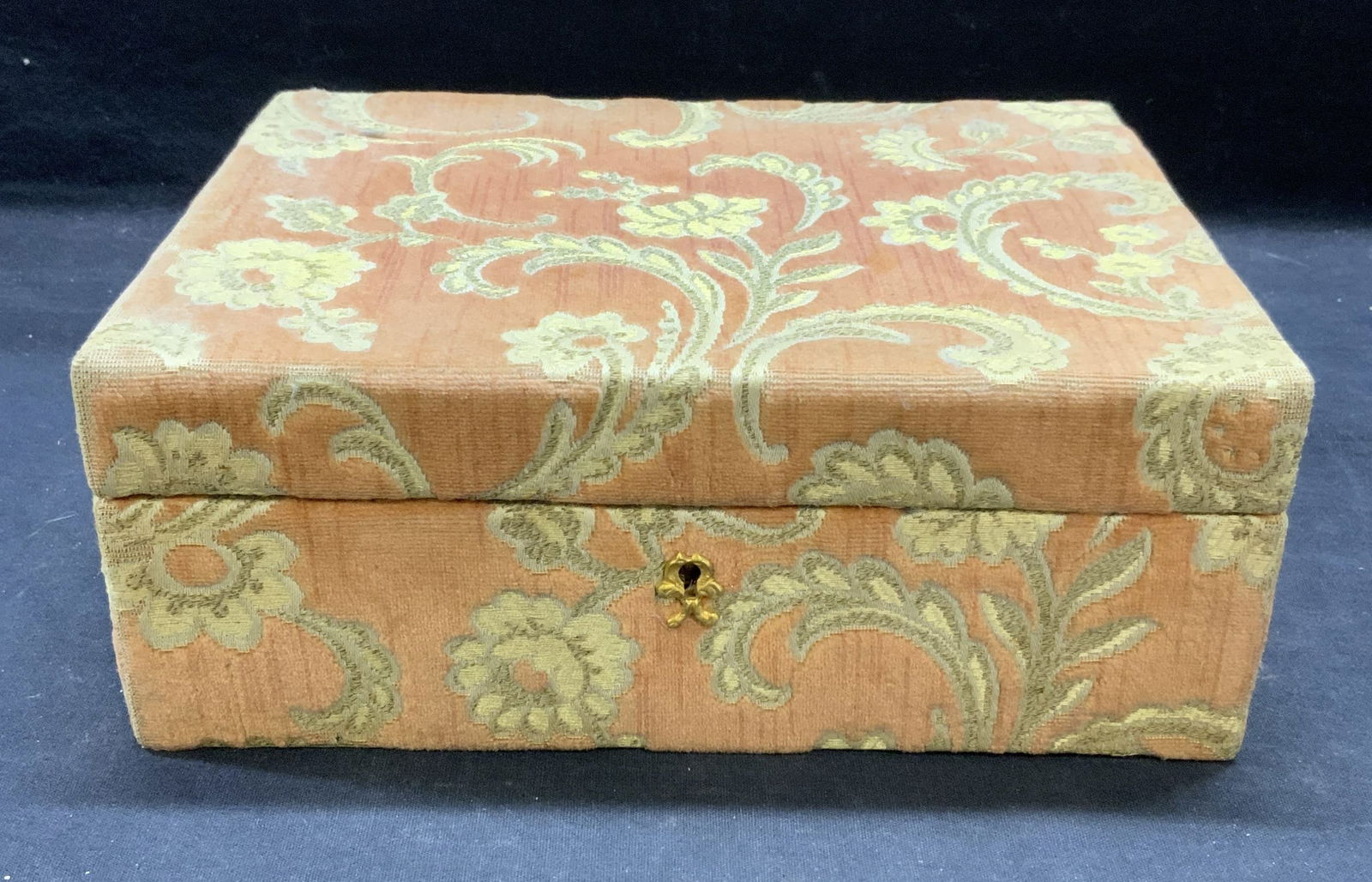 Vintage Floral Fabric Jewelry Box: Vintage fabric covered jewelry box with floral motif in coral. Removable tray with fitted compartments to interior. Measures approx. 9.5 x 7.25 x 3.75 inches. Wear to material including fading and los