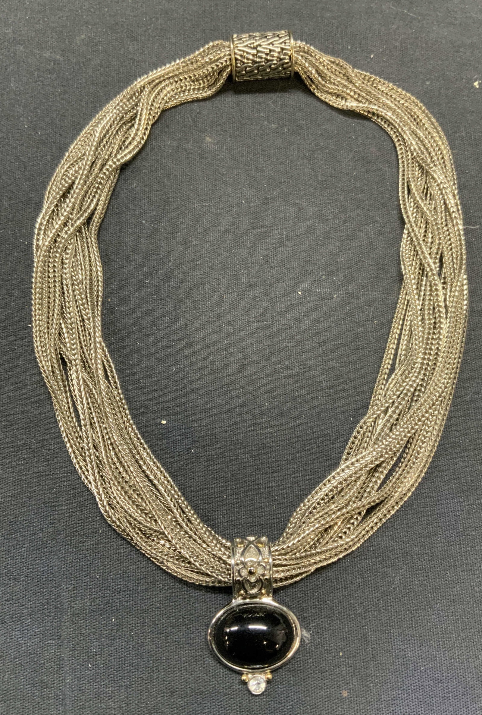 Vintage Silver Tone Multi Strand Pendant Necklace: Vintage silver tone multi strand necklace with black cabochon and colorless crystal pendant. Drop length approx. 7 inches. Some scratching observed. Estate jewelry, costume jewelry, cocktail jewelry, 