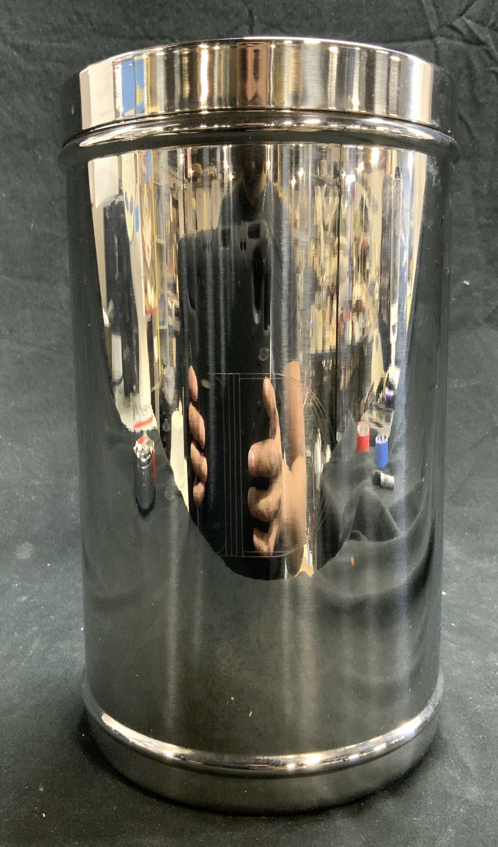 INOX WILLIAMS SONOMA Metal Wine Bot Holder ITALY: Underside inscribed INOX MADE IN ITALY, tag reads WILLIAMS SONOMA. Monogrammed D on frontside. Piece is silver toned appears to be chrome. Bottle holder has cylindrical shape. Piece measures approxima