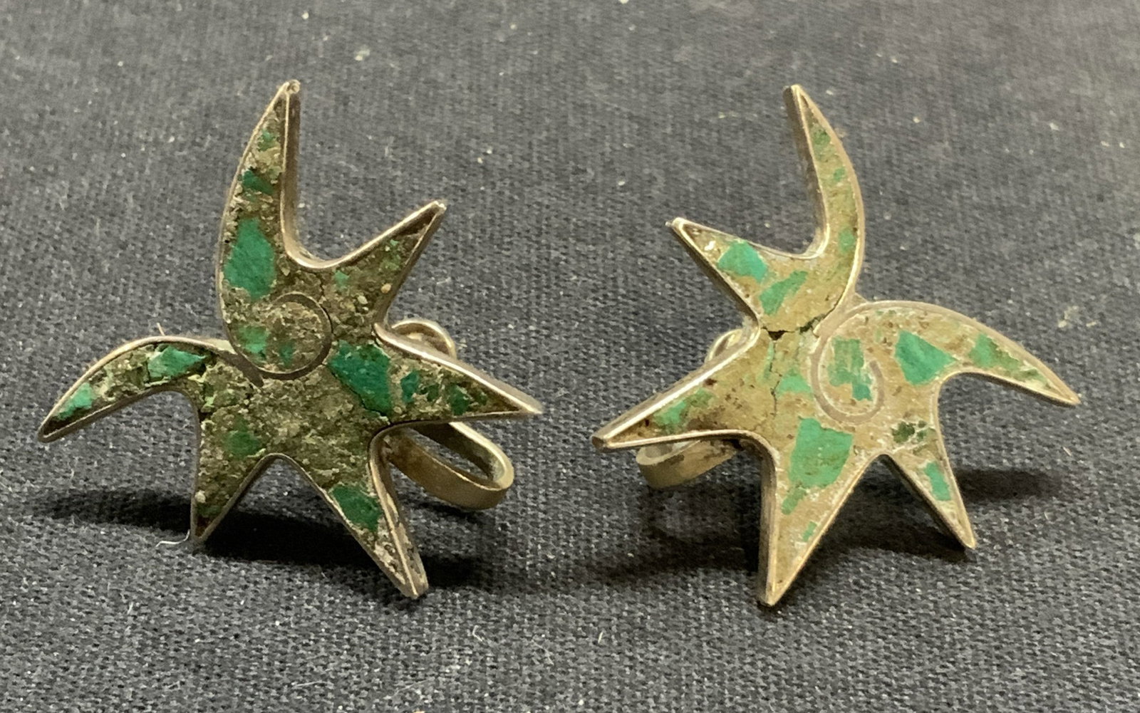 Vintage Sterling Silver Turquoise Earrings: Vintage sterling silver and inlaid turquoise earrings. Screw backing. Test for sterling using PuriTEST kit. Measure approx. 1.25 inches wide. Total weight 6.1 grams. Some scratching observed. Estate j