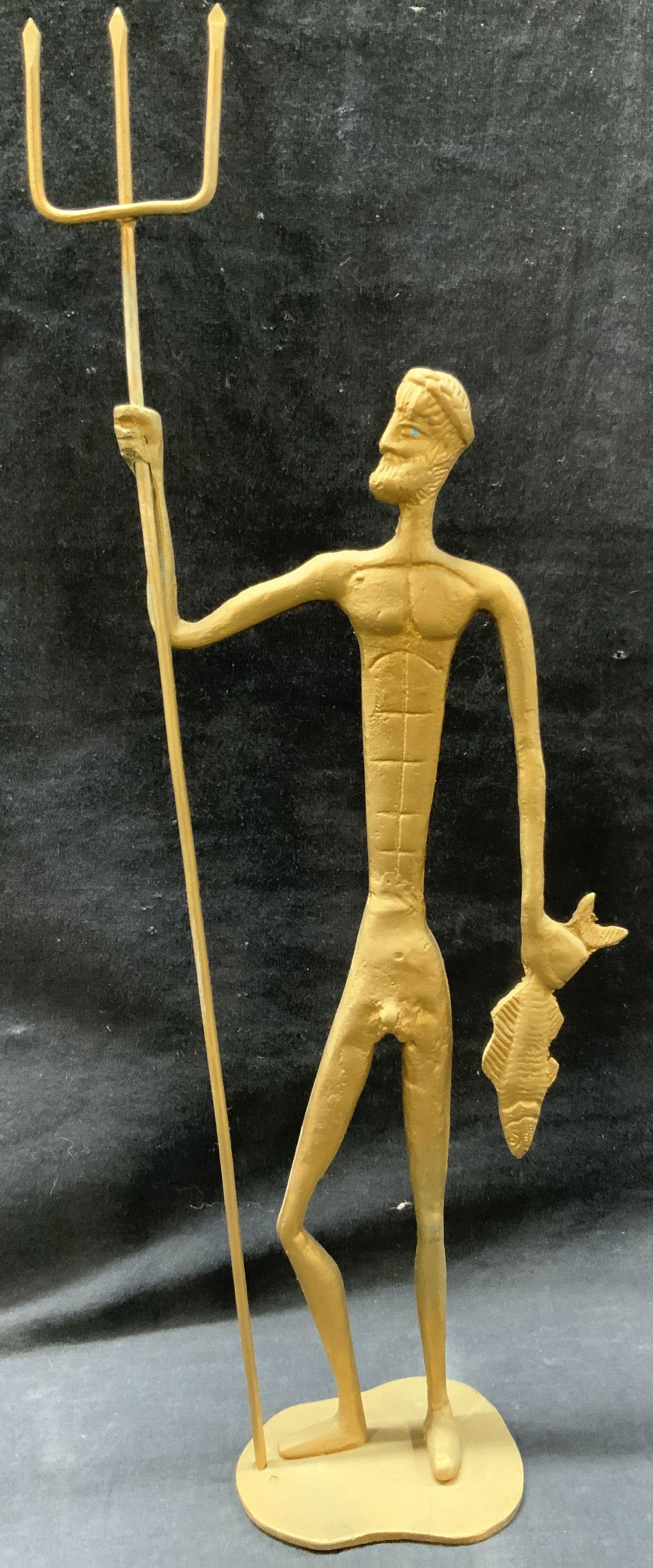 Mid Century Brass Poseidon Figural 20in: Mid century crafted brass sculpture of Poseidon holding a fish and his trident in both hands with blue painted eyes. Approx 20 inches tall and 4 inch wide base. Moderate surface wearing to brass due t