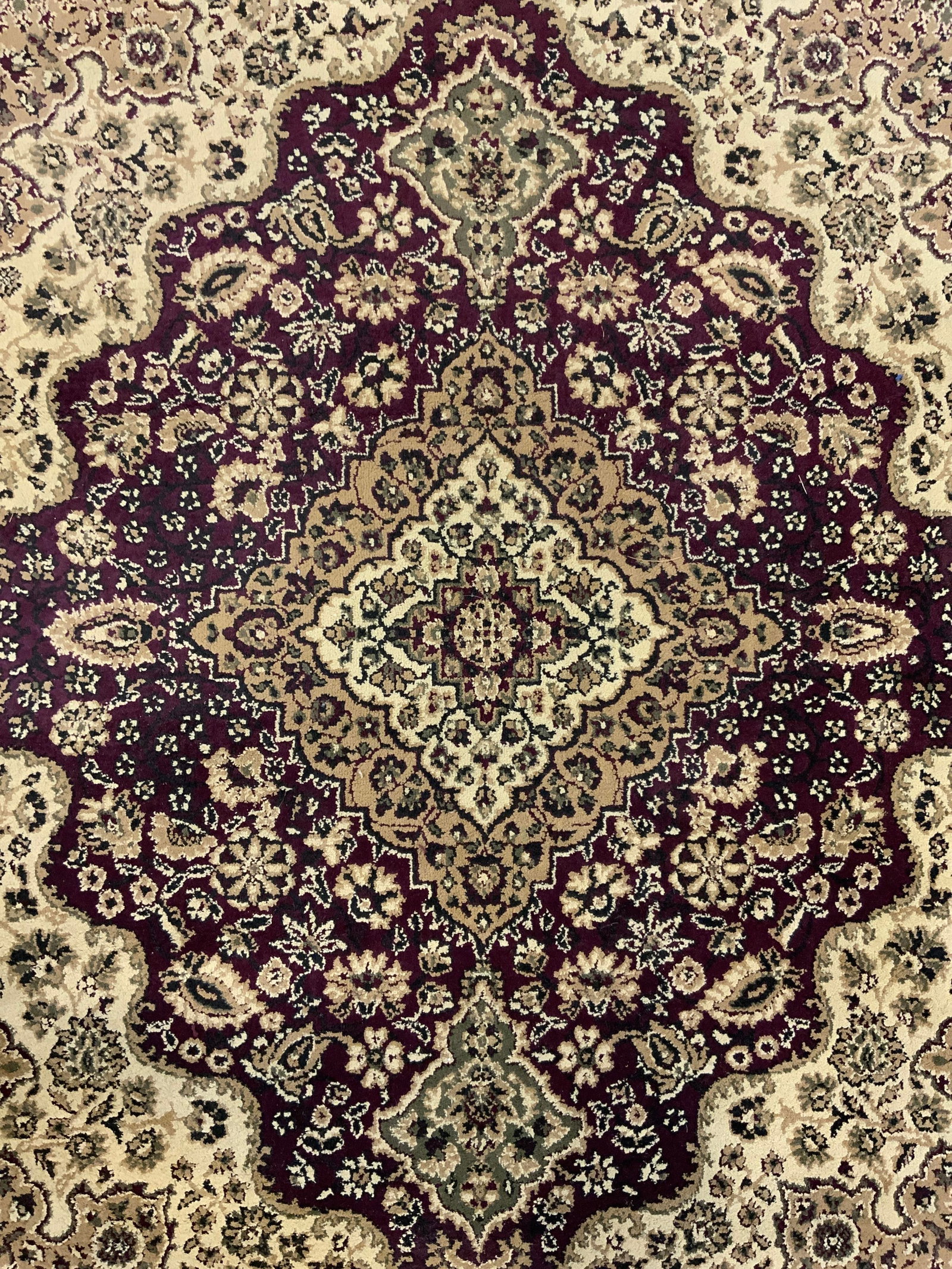 CASTELLO Vintage Poly Oriental Area Rug: Tag on underside reads CASTELLO. Rug has intricate multi toned floral motif detail. Rug appears to be vintage. Rug measures approximately 88 inches long 64 inches wide. Rug, carpet, CASTELLO rug, poly