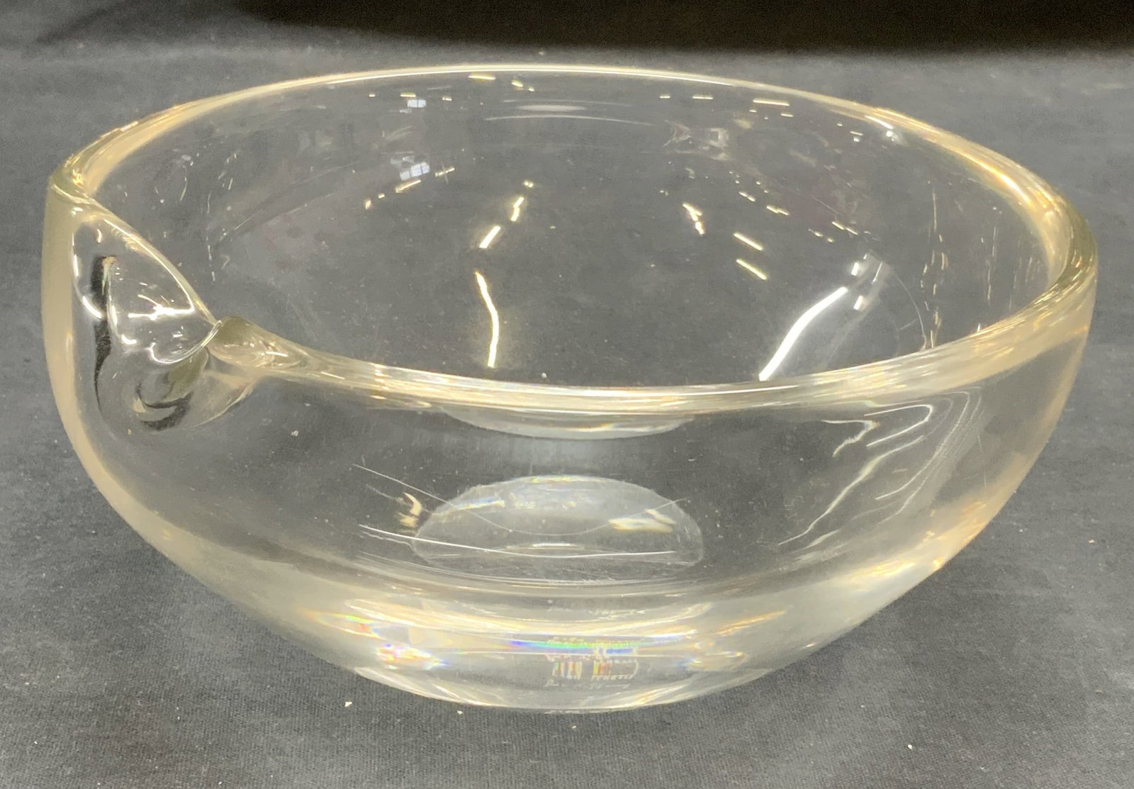 Elsa Peretti for Tiffany Crystal Thumbprint Bowl: Elsa Peretti for Tiffany Thumbprint bowl. Organic shaped indent on rim. Thick walled crystal. Signed to underside. Measures approx. 7.25 x 3.5 inches. Some scratching observed. Elsa Peretti, Elsa Pere
