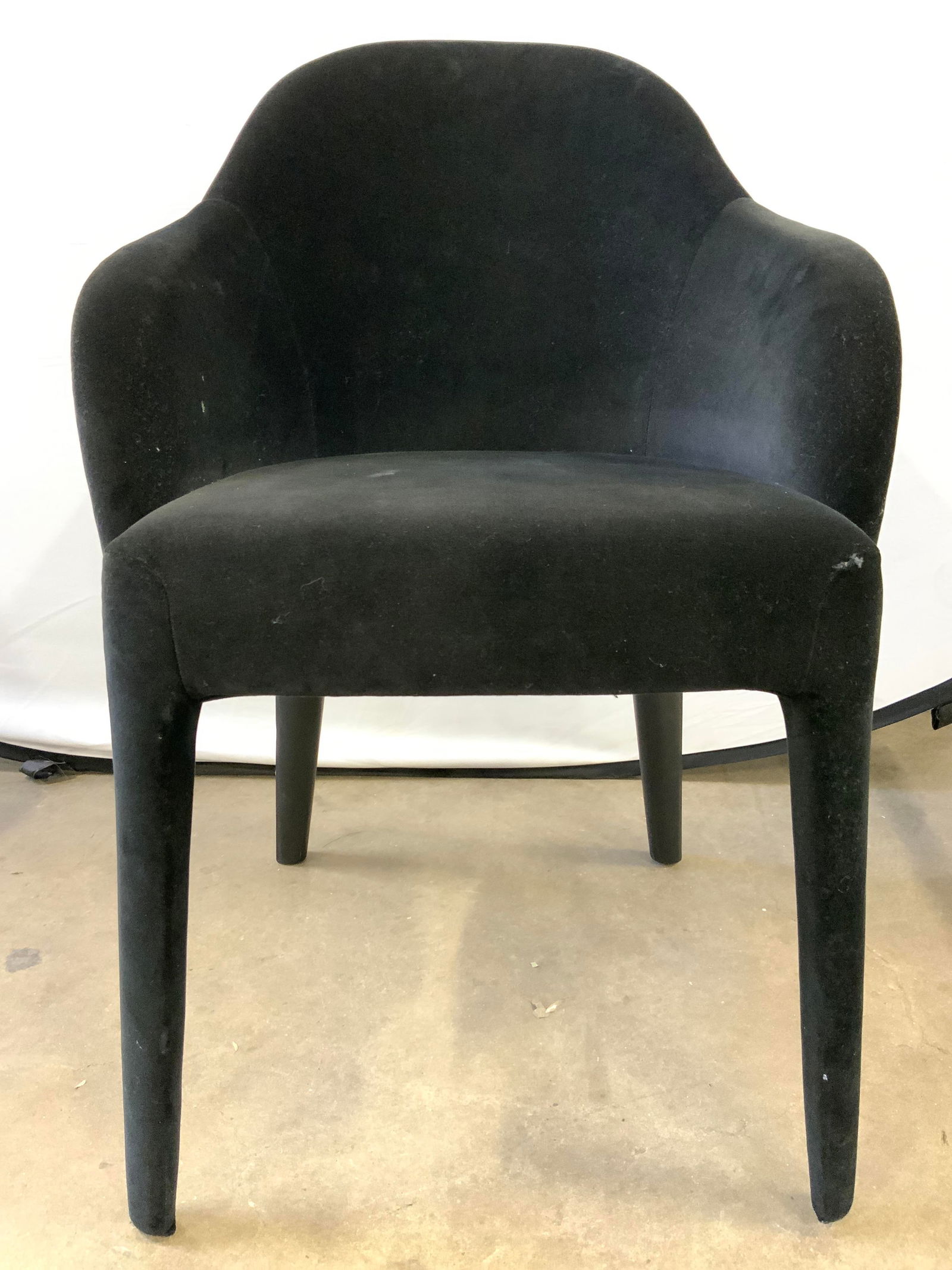 CHRIS BANGLE FENDI Crushed Velvet Audrey Chair: Underside has FENDI Trademark. Chair is black toned & upholstered with crushed velvet. Designed by Chris Bangle. Chair has slightly splayed legs, arched backrest & curved sloping armrests. Chair is bl