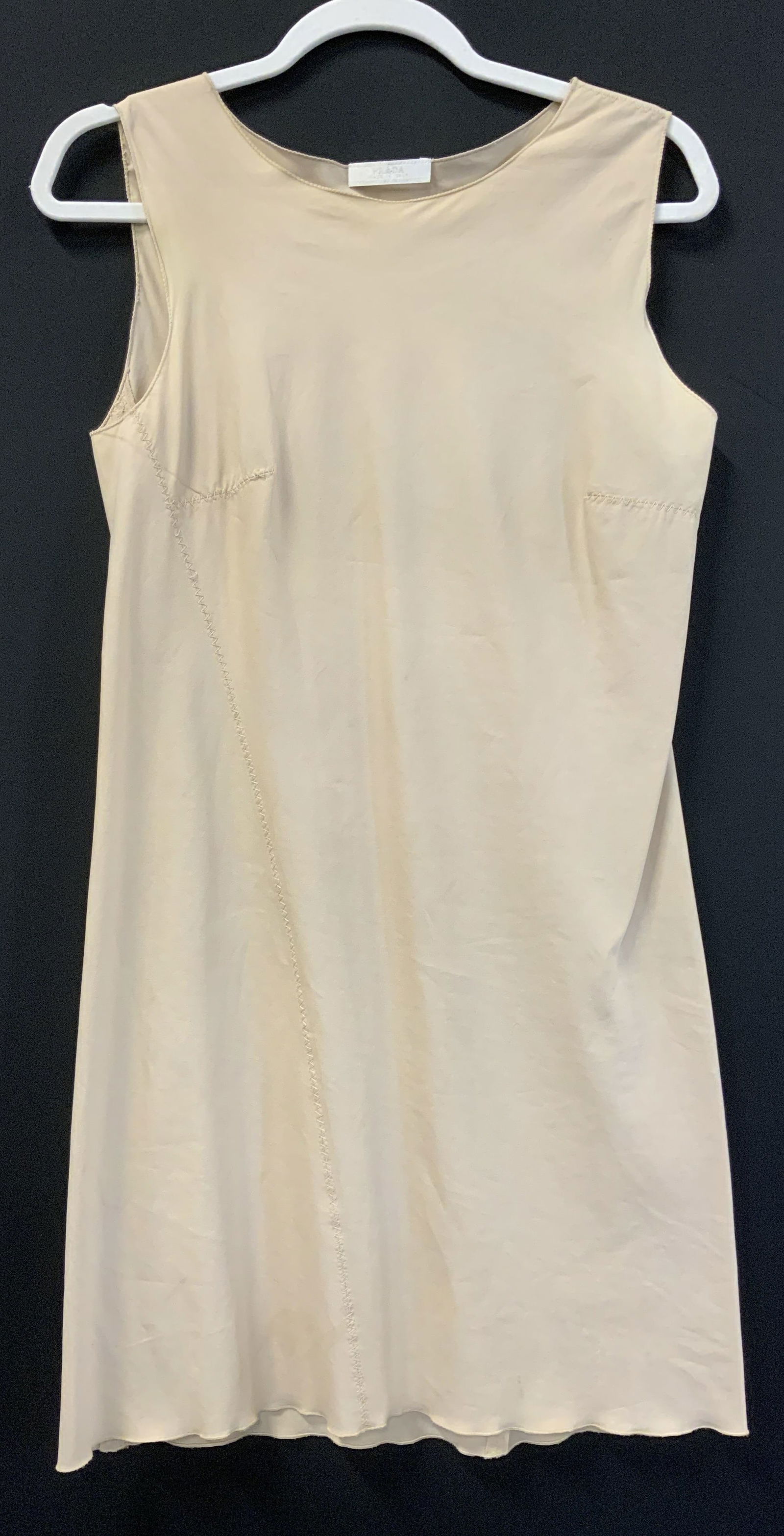 PRADA Cotton Blend Summer Sleeves Dress, Italy: Vintage Prada sleeveless dress in beige. Size 4/Italian size 38., Made in Italy. 72% cotton, 23% nylon and spandex. Designer label reads Prada made in Italy,. 34.5 in., Long. Mild spotting observed. P