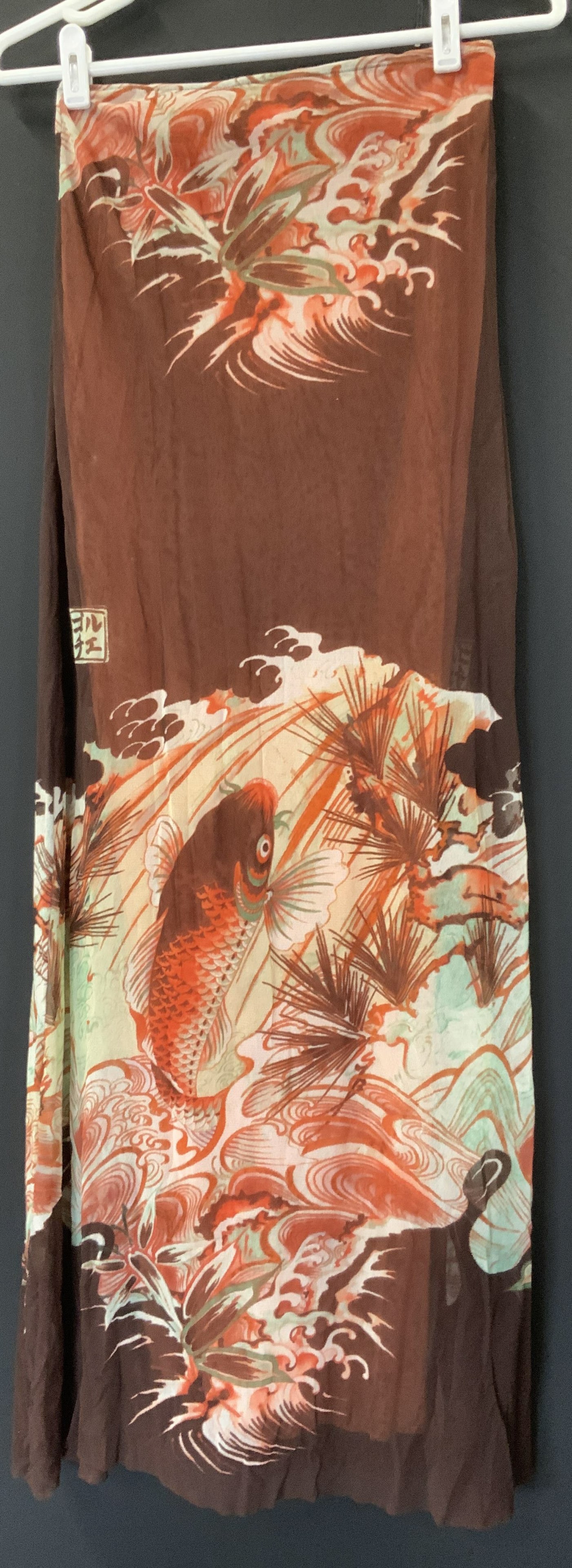 Jean Paul Gaultier Asian Fish Mesh Skirt, Italy: Jean Paul Gaultier Soleil long length Asian print skirt. Size medium. Label attached. Made in Italy. Double mesh polyamide nylon fabric. Stretch waist and form fitting. 41 in. Long. Asian koi fish pri