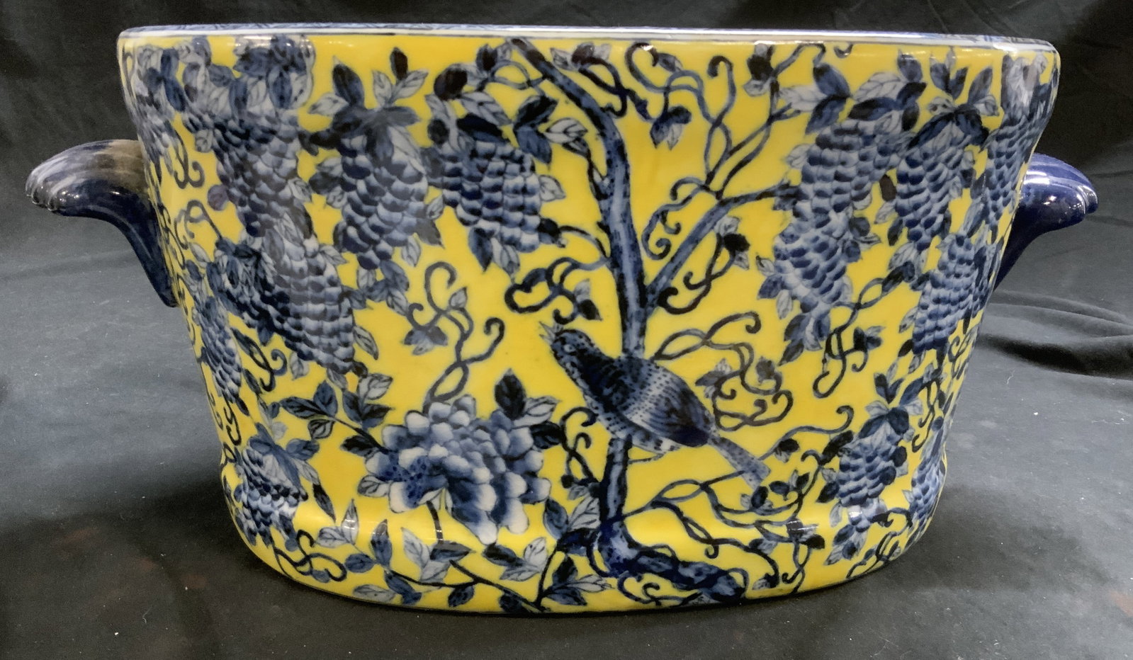 Asian Chinoiserie Yellow & Blue Porcelain Planter: Vintage Asian Cizhou deep fish bowl porcelain planter . Asian hallmark on underside. Depicts pheasant , vines, and interior is decorated with koi fish. Cobalt blue and yellow with scalloped handles. M