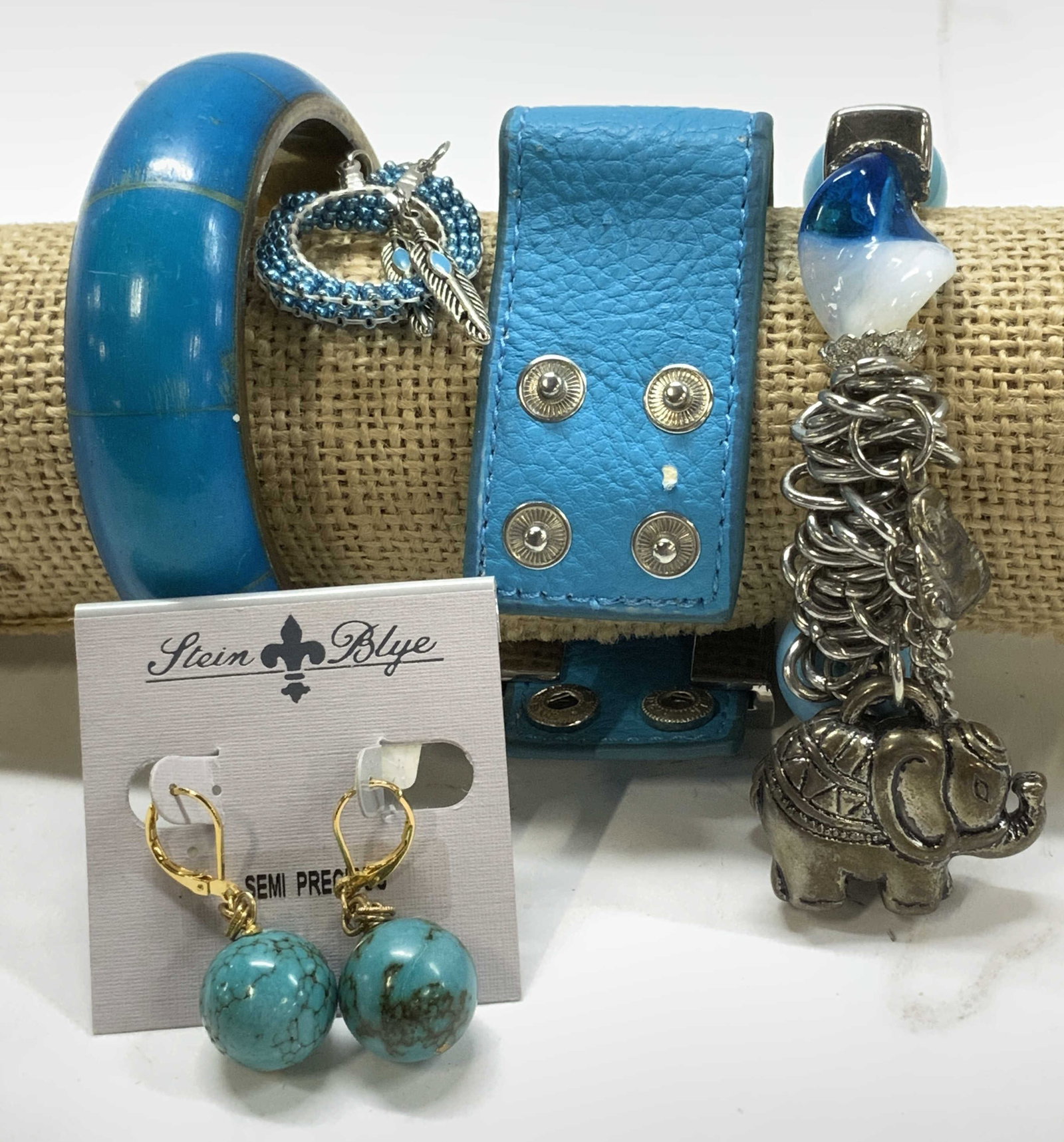 Grp 5 Chunky Bracelets, Turquoise Earrings NIP: Stein Blye Spherical Turquoise bead pendant earrings with lever back, 1.5 in. Drop. New in package. 55 cts. Iridescent micro bead dangle hoops earrings with Native American feather on leaver back, 2.2