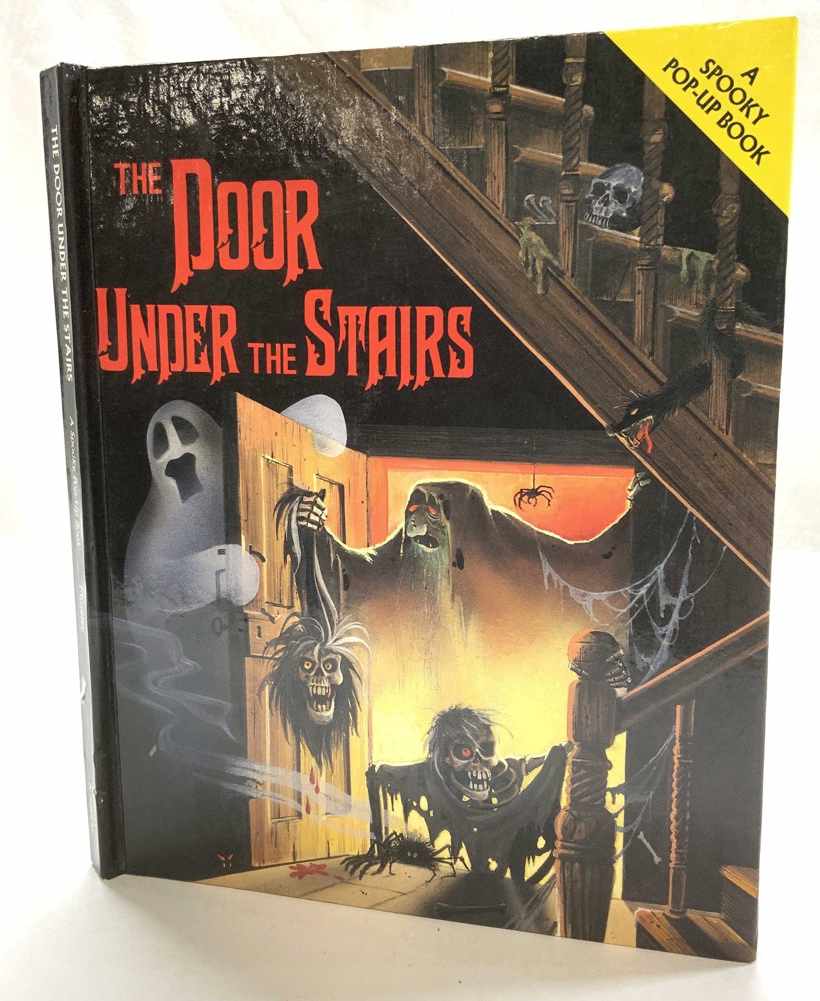 Halloween Childrens Pop Up Picture Book 1990: The Door Under the Stairs , a Spooky Pop up book illustrated by Andy Everett- Stewart., Compass Productions, / Grosset & Dunlap , c 1990., hand assembled pop ups . Approx 9.5 x 7.5 in. Childrens Pop U