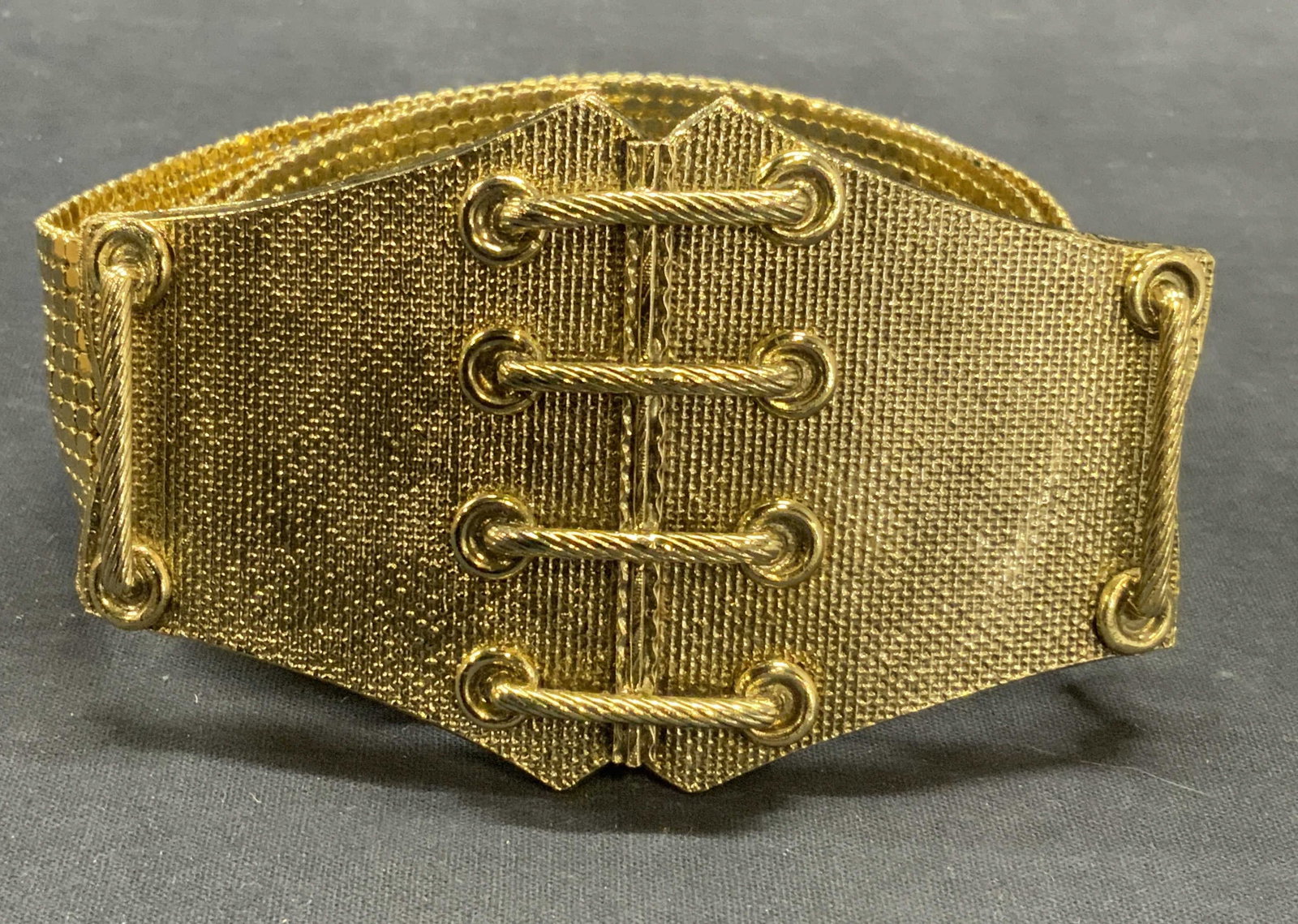 Gold Tone Mesh Chain Belt: Gold tone mesh chain belt. Measures approx. 33 inches long. Buckle approx. 2.75 inches wide. Some scratching observed. Ladies belt, ladies gold tone belt, ladies mesh belt, ladies metal belt, ladies c