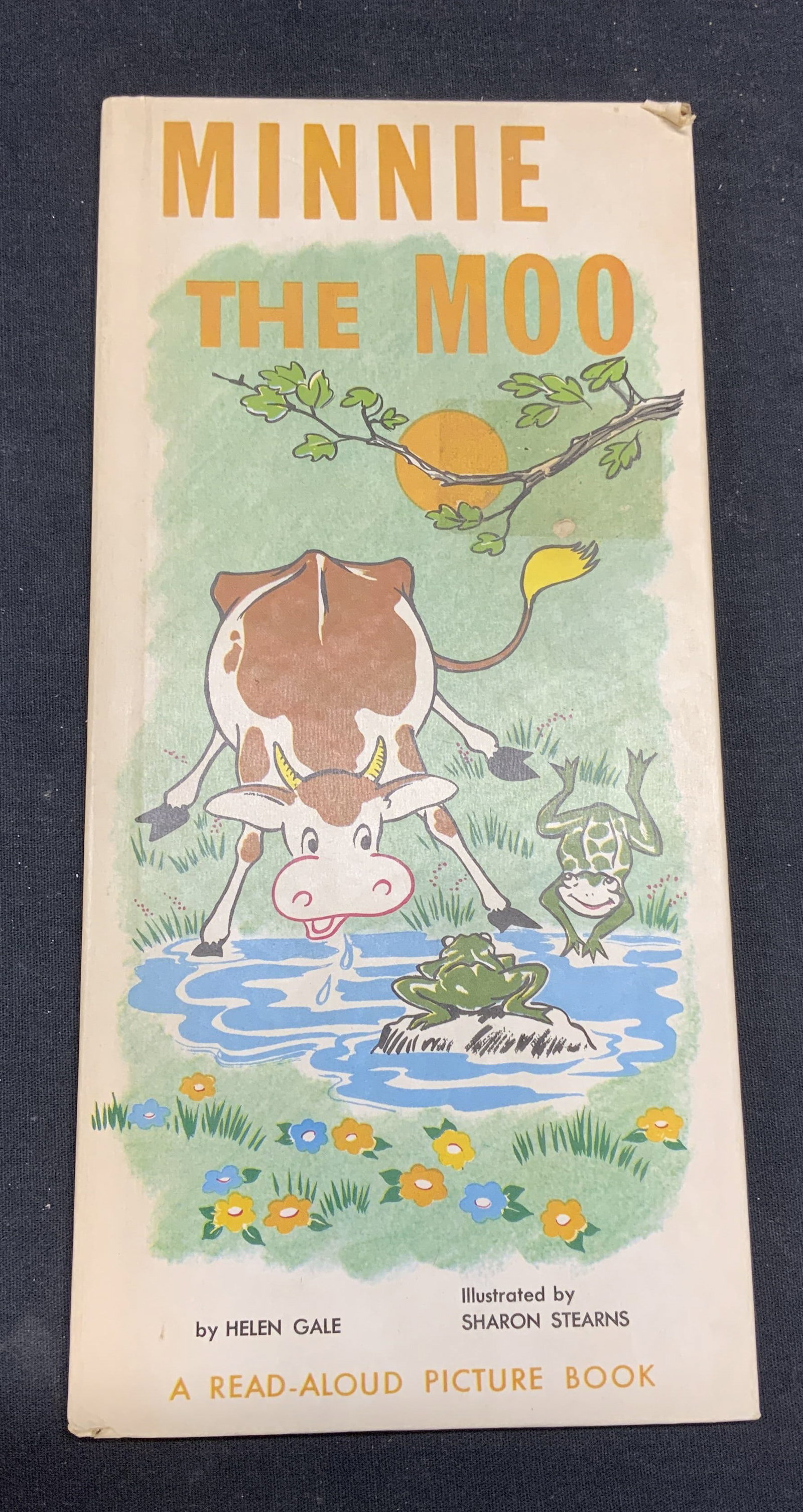 Minnie The Moo Helen Gale Illustrated Book: Vintage hardcover copy of Minnie the Moo by Helen Gale. Illustrated by Sharon Stearns. Published by Samuel Lowe Company, date unknown. Measures approx. 11.25 x 5.25 inches. Wear to cover, pages, and s