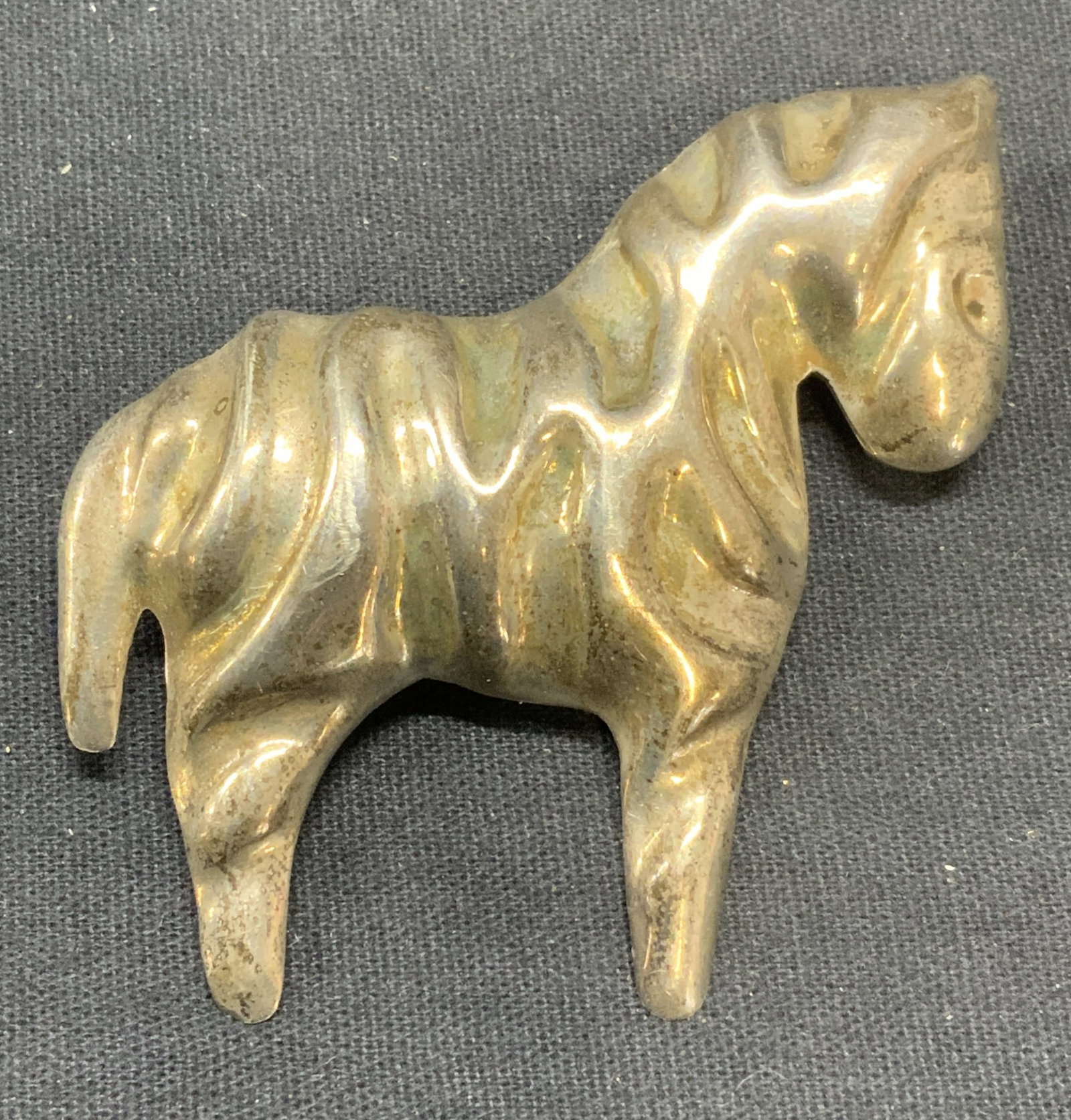 Vintage Sterling Silver Donkey Brooch, Mexico: Vintage sterling silver sculptural donkey brooch. Marked 925 Mexico to underside. Hinge pin to underside. Total weight .57 ozt. Measures approx. 2 3/8 x 2.75 inches. Some scratching observed. Estate j