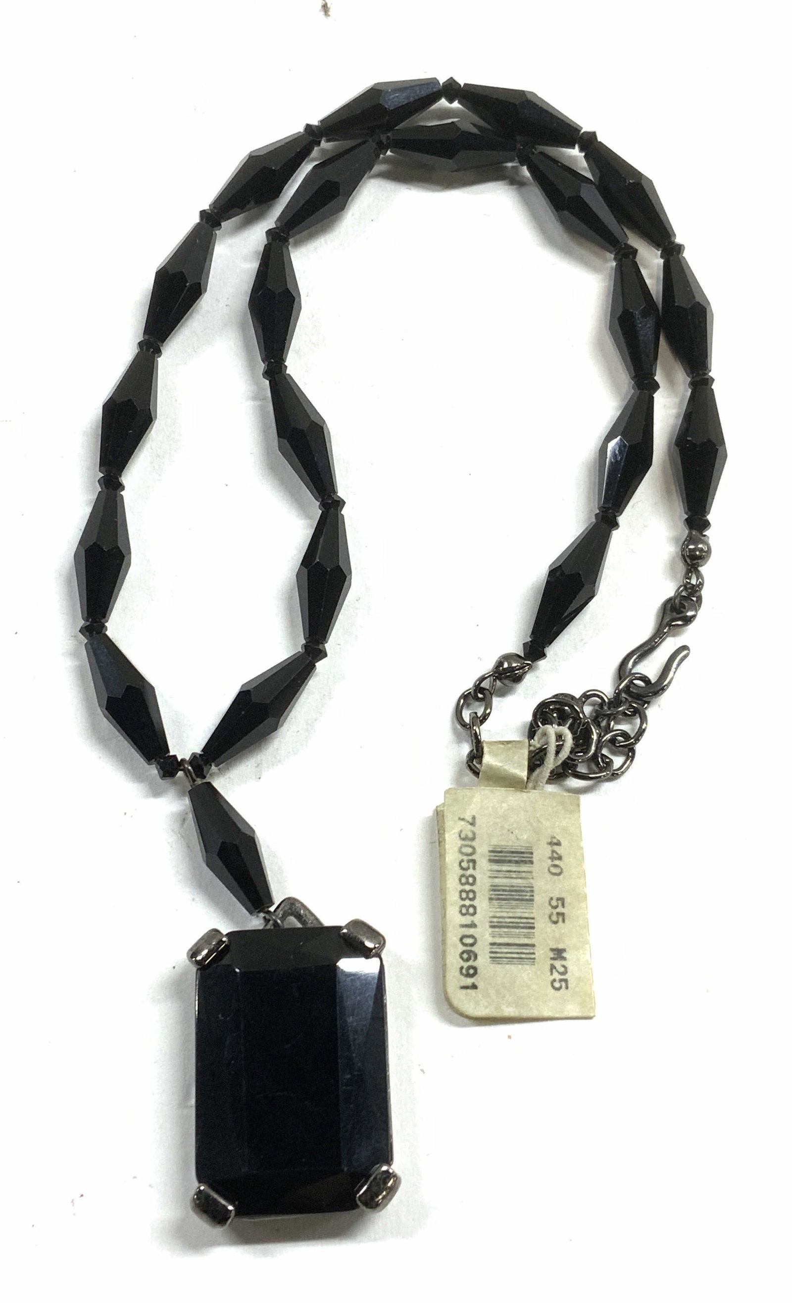 Carolee Black Glass Crystal Pendant Necklace NWT: Carolee faceted black glass crystal pendant necklace. Signed on hang tag. New with tag. Drop length approx. 8 inches. Pendant measures approx. 1.25 x .75 inches. Some scratching observed. Estate jewel