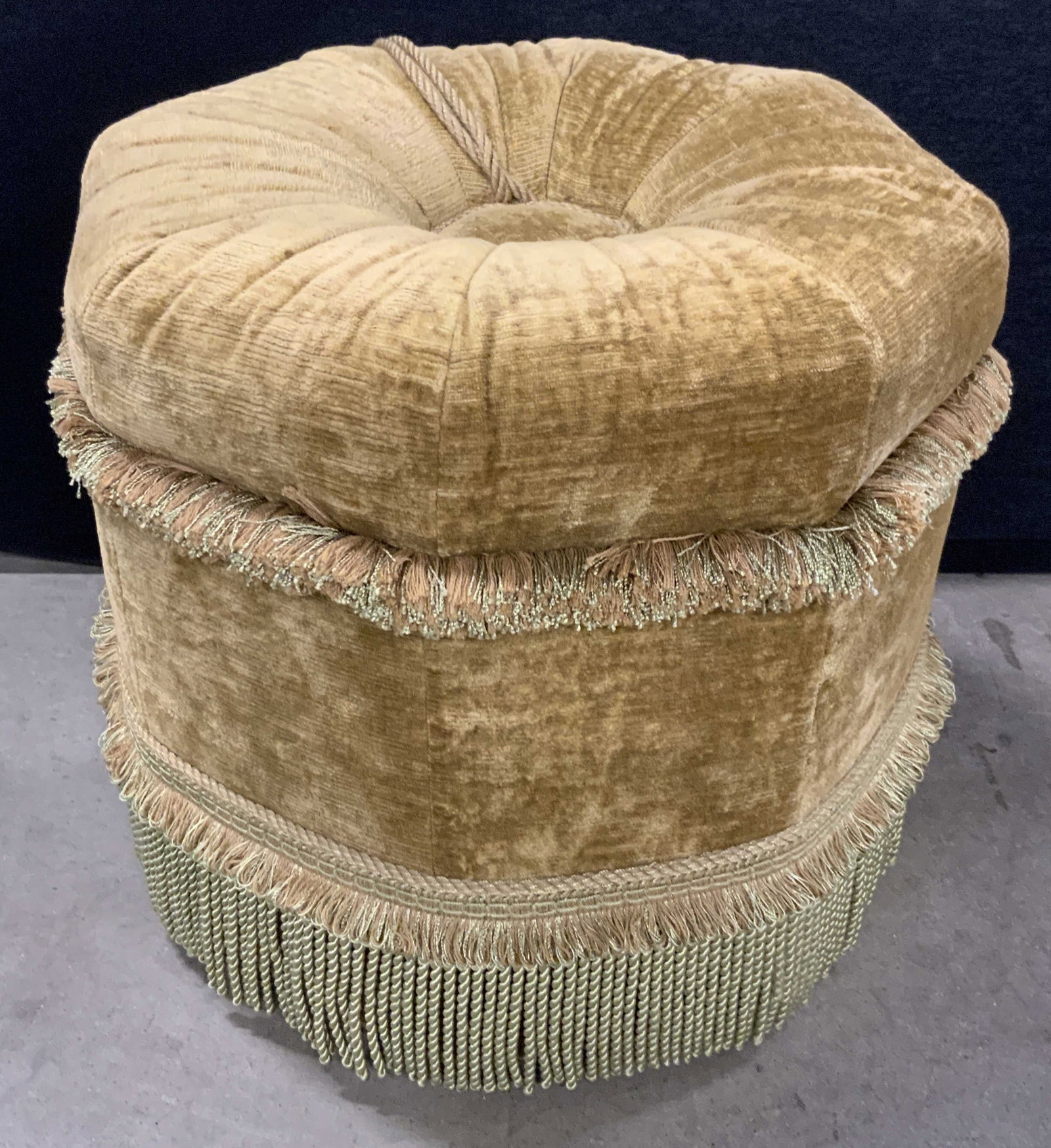 Vintage Velvet Upholstery Ottoman W/ Tassels: A vintage soft hand velvet style upholstered ottoman. Tassel accent. Measures approx. 18H x 18.5W in. Some discoloration and surface wear present. Vintage Ottoman, vintage furniture, vintage footstool