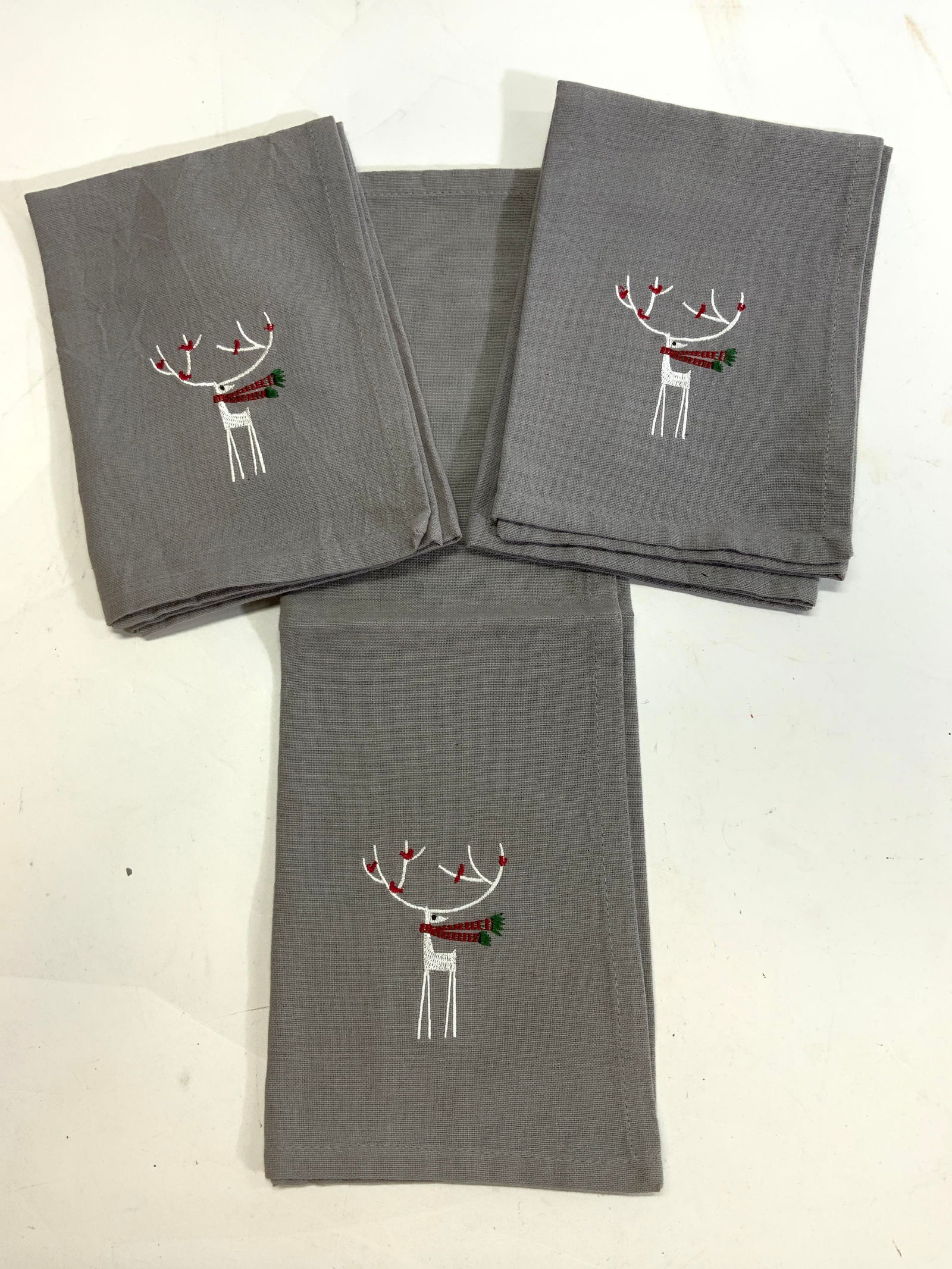Reindeer Cotton Napkin Set 3 by Harman, New: Embroidered reindeer Christmas motif cotton napkins in grey. Made in India. 18 x 17.5 in. label attached. Property of Manhattan Estate DuPont Heir. Harman Reindeer Cotton Napkins, Holiday Dinner Napki