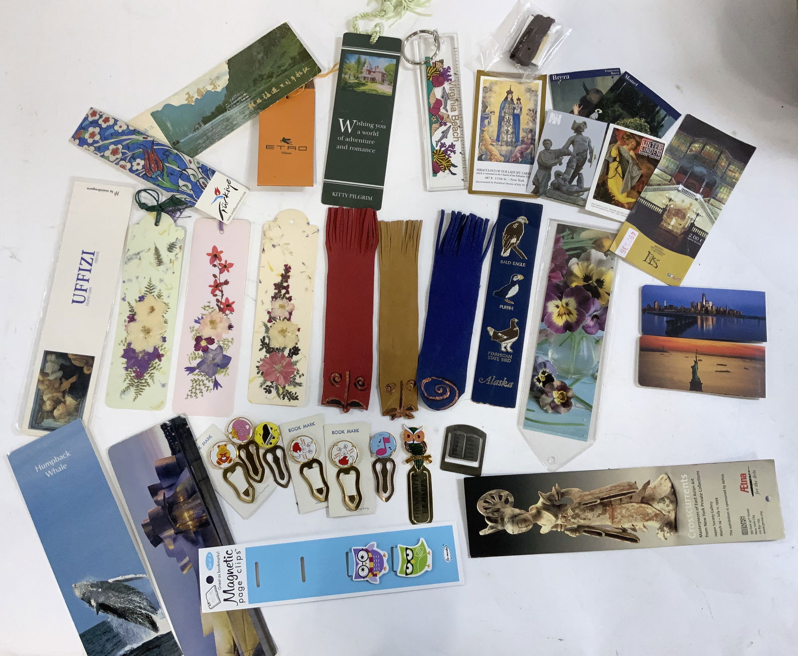 Lrg Lot Leather/Laminated Books Marks, Museum Tkts: Collection of bookmarks, keychain, and tourism tickets , magnetic book marks from museums , etc. Several, book marks are hand crafted leather and hand crafted with pressed flowers and laminated. New Y