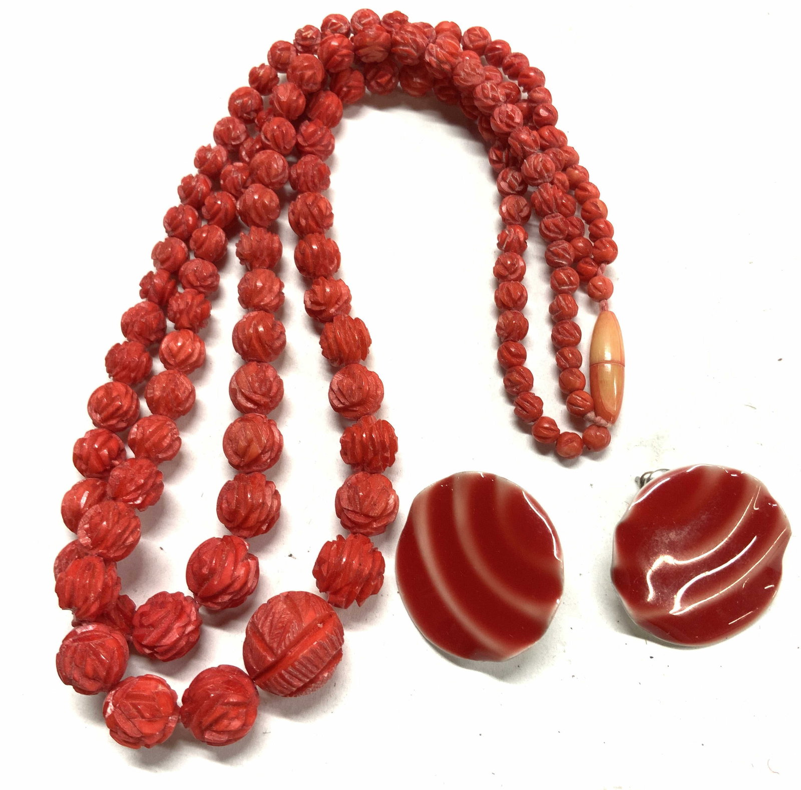 Enamel Earrings, Rose Bead Choker Necklace, 3: Double strand of carved resinous rose beads in a red coral tone. Drop is 6.25 in. Pair of embossed enamel metal earrings with a red/ coral tone. Post and backs. 1 in. Chunky jewelry, statement Jewelry