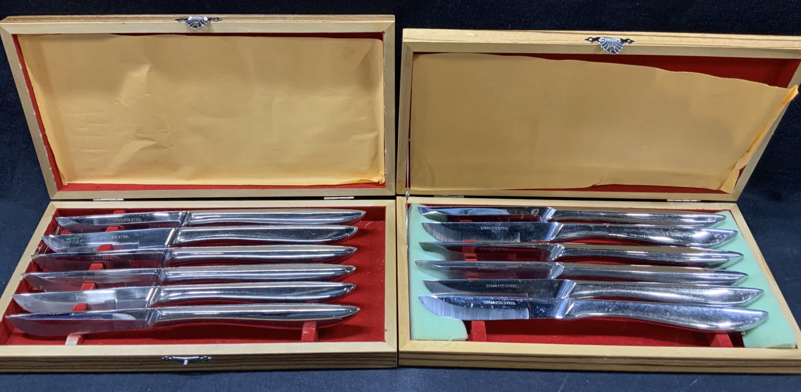 Set 12 Stainless Steel Dinner Knife W Boxes, Japan: Lot of 2 boxes of with six stainless steel knives, marked on blades Japan. Boxes are tan toned with wood grains on top. Knives are approx 8.5 inches long and boxes are approx 5.25 x 9.75 x 1.25 inches