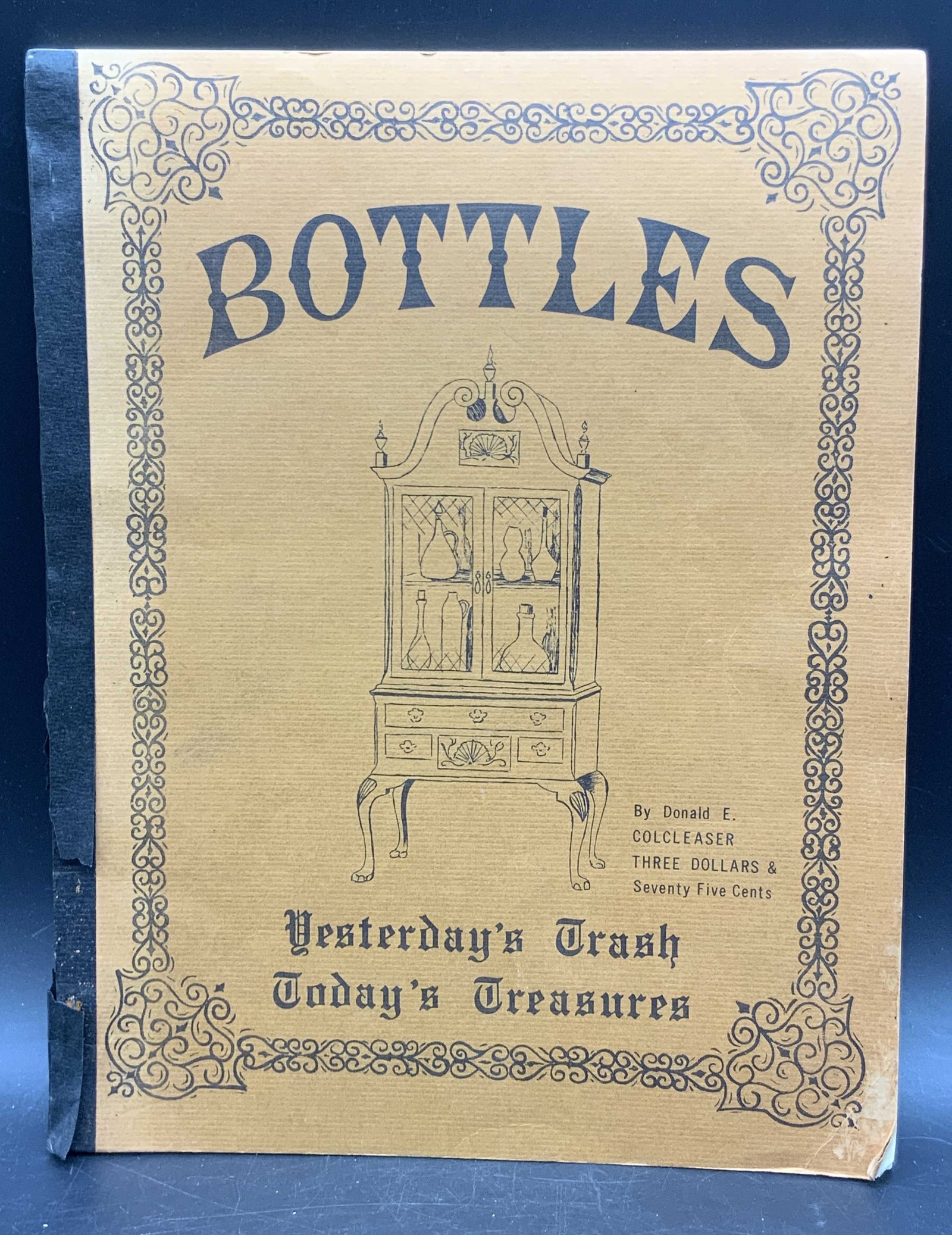1968 BOTTLES by Donald Colcleaser, Illustrated Book: Bottles by Donald E. Colcleaser. Sixth printing 1968. Printed by Bettys Letter Shop. 20+ illustrations to interior. Measures approx. 11H x 8.5W in. Losses and discoloration present. Surface wear prese