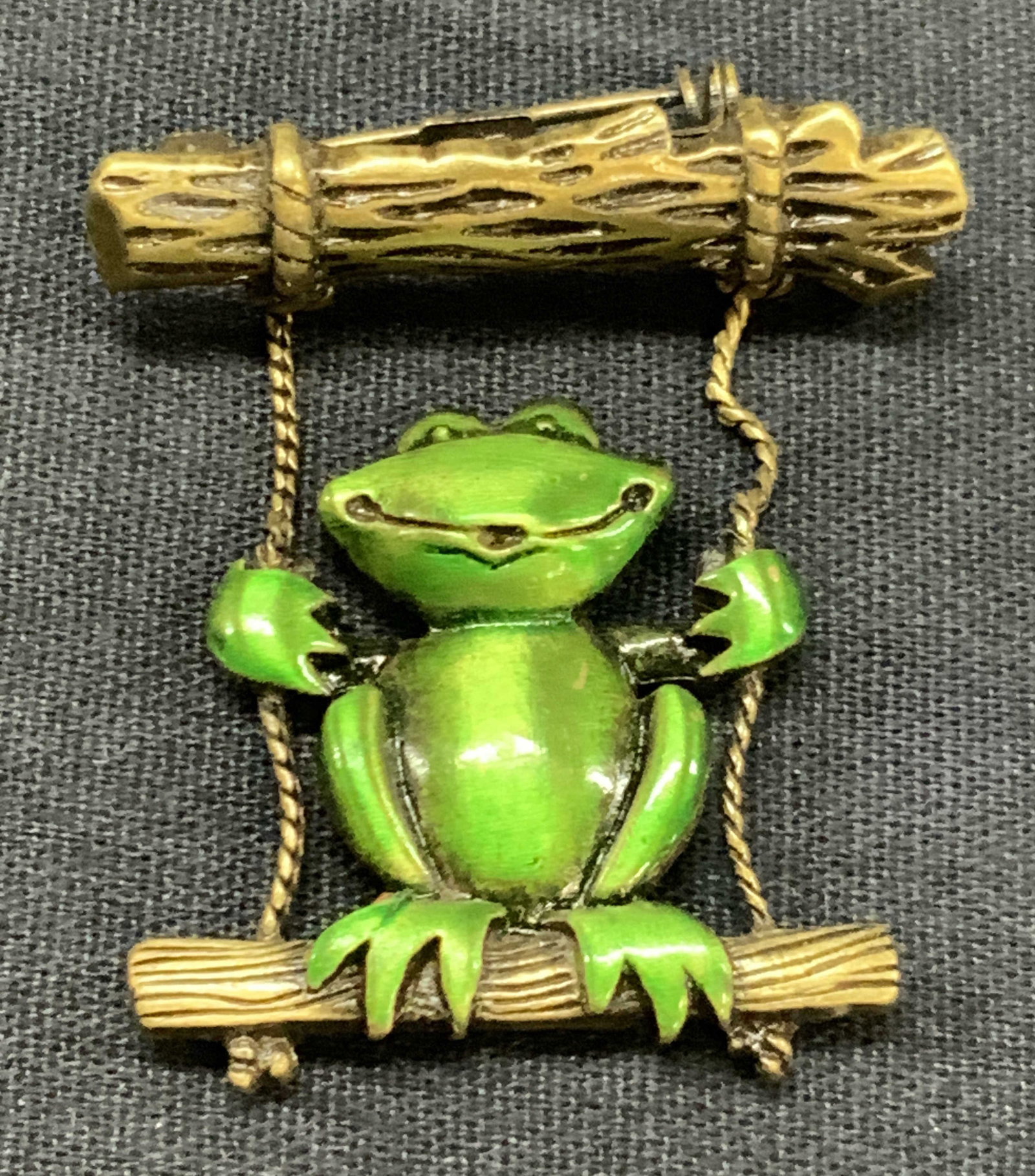 JJ Vintage Metal & Enamel Frog Brooch: Stamped JJ on backside, a brass and enamel frog brooch. Approx, 2 in long and 1.25 inches wide. Moderate wearing to brooch due to age and use. Brass brooches, brooch, frog jewelry, jewelry, pin, frog 