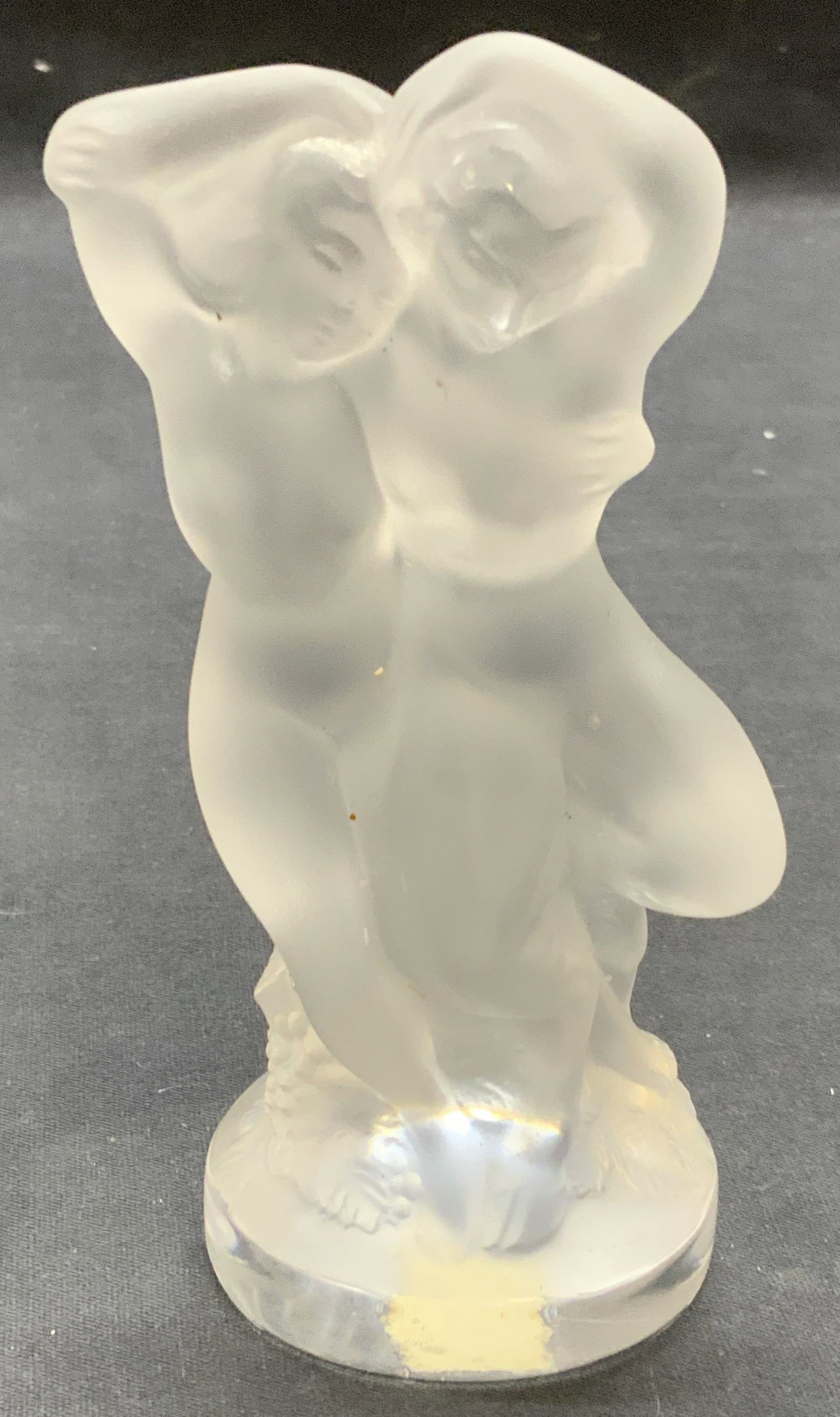 Vintage Lalique France Crystal Faun Figural: Vintage Lalique crystal woman and faun figural. Frosted crystal with sculpted surface. Signed to underside. Made in France. Measures approx. 2.75 x 2 x 5.5 inches. Some scratching observed. Lalique, L