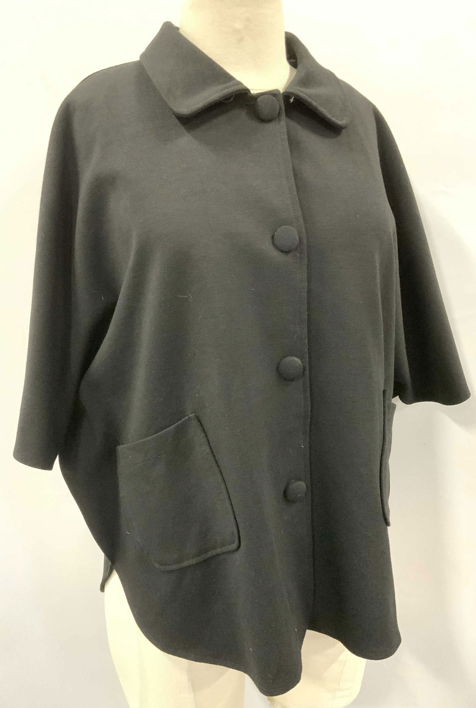 Jeanyes Collection Black Label Jacket: Labeled Jeanyes collection polyester knit jacket, fully lined. Size large. Short sleeves and covered fabric buttons. Hand pockets. Ladies wearables, short sleeve jacket, black wearables, vintage wear,