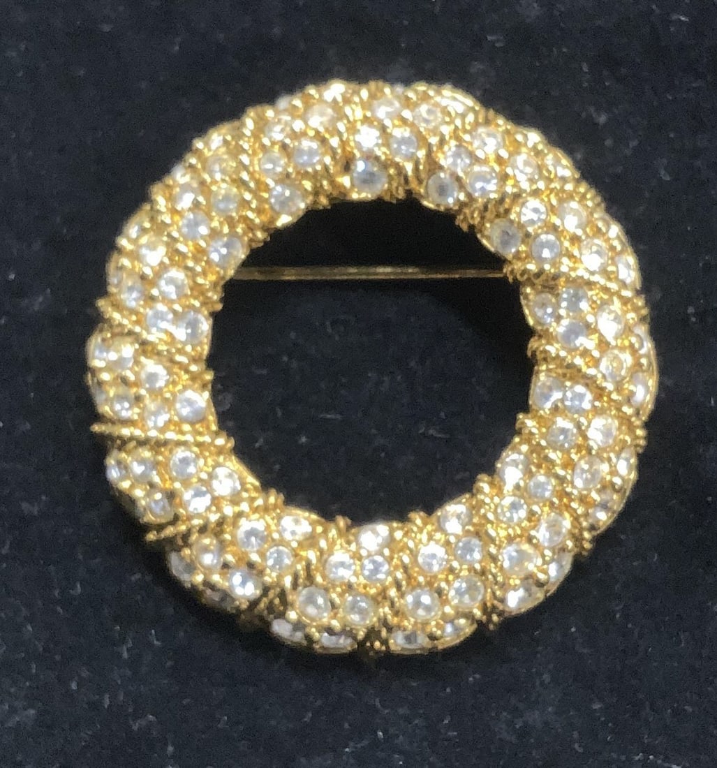 Swarovski Crystal Gold Tone Circle Brooch, Pouch 2: Swarovski Gold tone circle brooch with clear crystals . Trademarked with Swarovski swan. Brooch measures 1.25 in. Comes with a Swarovski Jewelry pouch. Luxury Estate Jewelry, luxury vintage jewelry, L