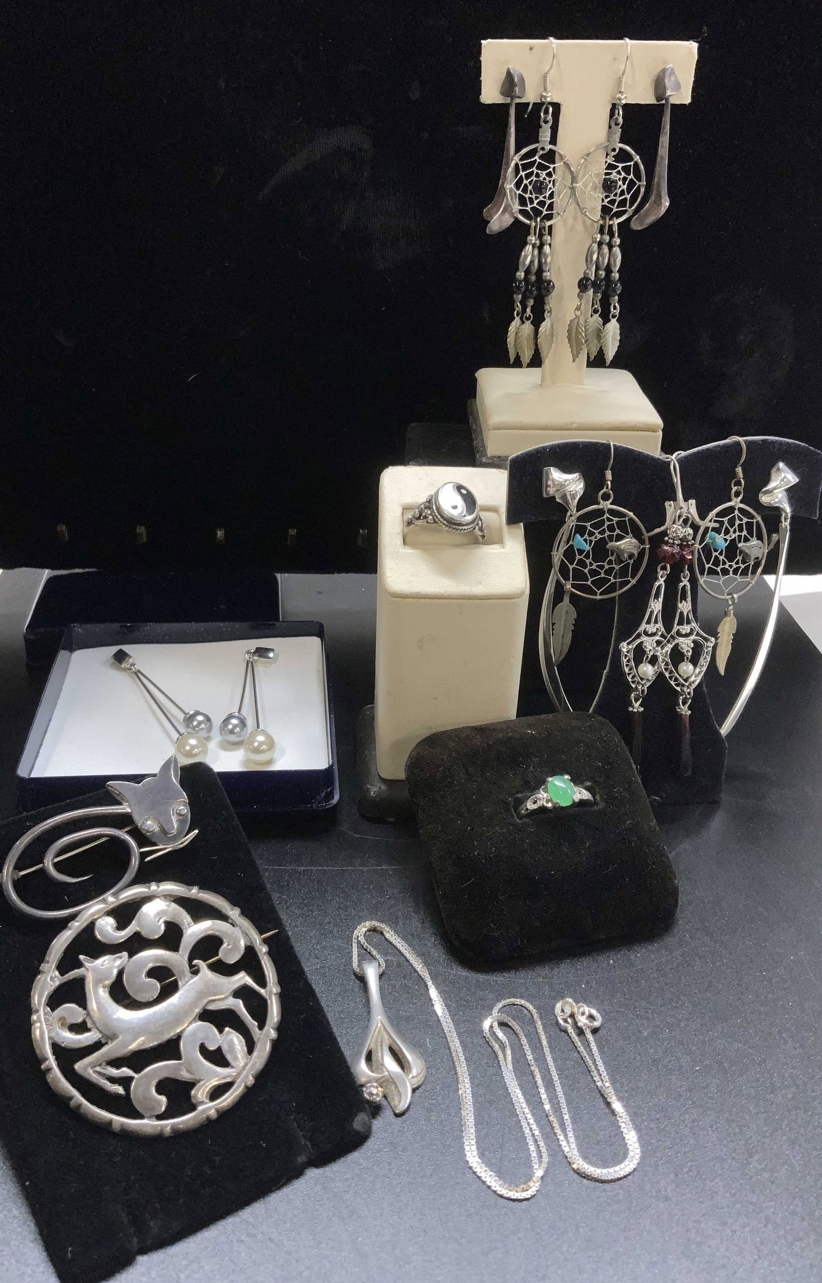 Sterling Silver Jewelry-Earrings,Brooch,Ring,18: Large lot of sterling silver jewelry, 1.8 ozt for all sterling. 18 individual pieces. All pieces that ate not marked for sterling have been tested using the PuriTEST kit. items include: del fino Mexic