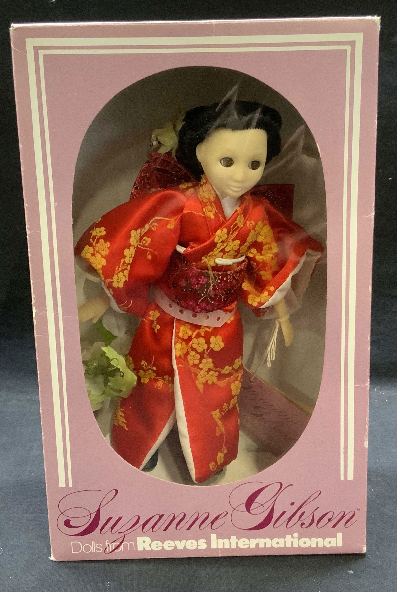 Suzanne Gibson Reeves International Japan Doll: Vintage Suzanne Gibson dolls form Reeves International Japan doll. Plastic and fabric. Includes original box. Doll measures approx. 8.5 inches long. Some surface wear consistent with exposure. Suzanne