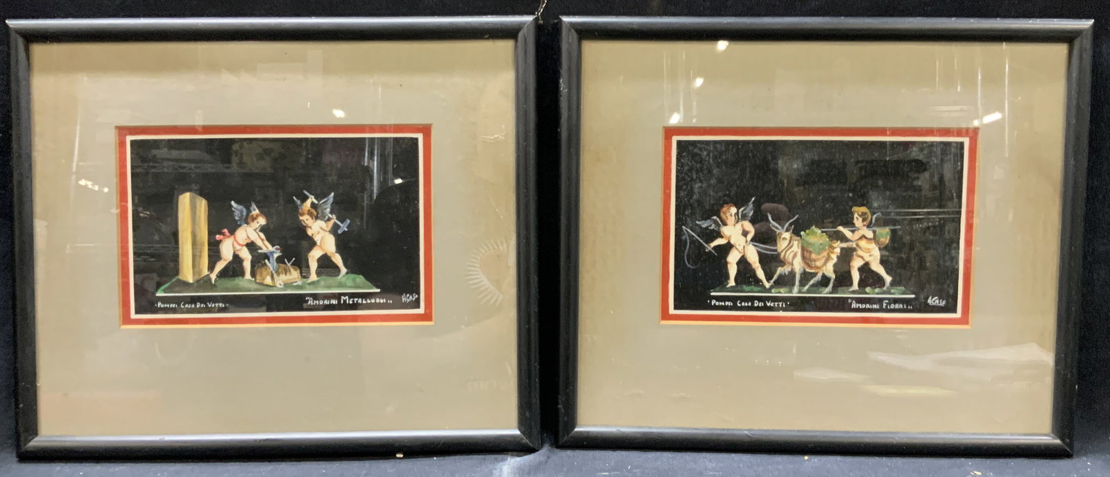 2 ACaso Sgd Cherub Watercolor Paintings: Lot of 2 signed watercolor paintings. Both signed ACaso and both read Pompei Casa del Vetti 1 image depicts two cherubs working on an anvil, reading Amorini Metallurgi, the other depicts two cherubs l