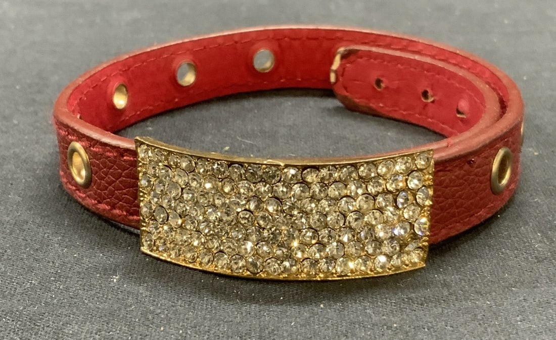 Red Leather & Crystal Collar Choker Necklace: Red leather and pave colorless crystal decorated choker necklace collar accessory. Measures approx. 15.5 inches long. Wear to leather and material consistent with Exposure. Some surface wear including