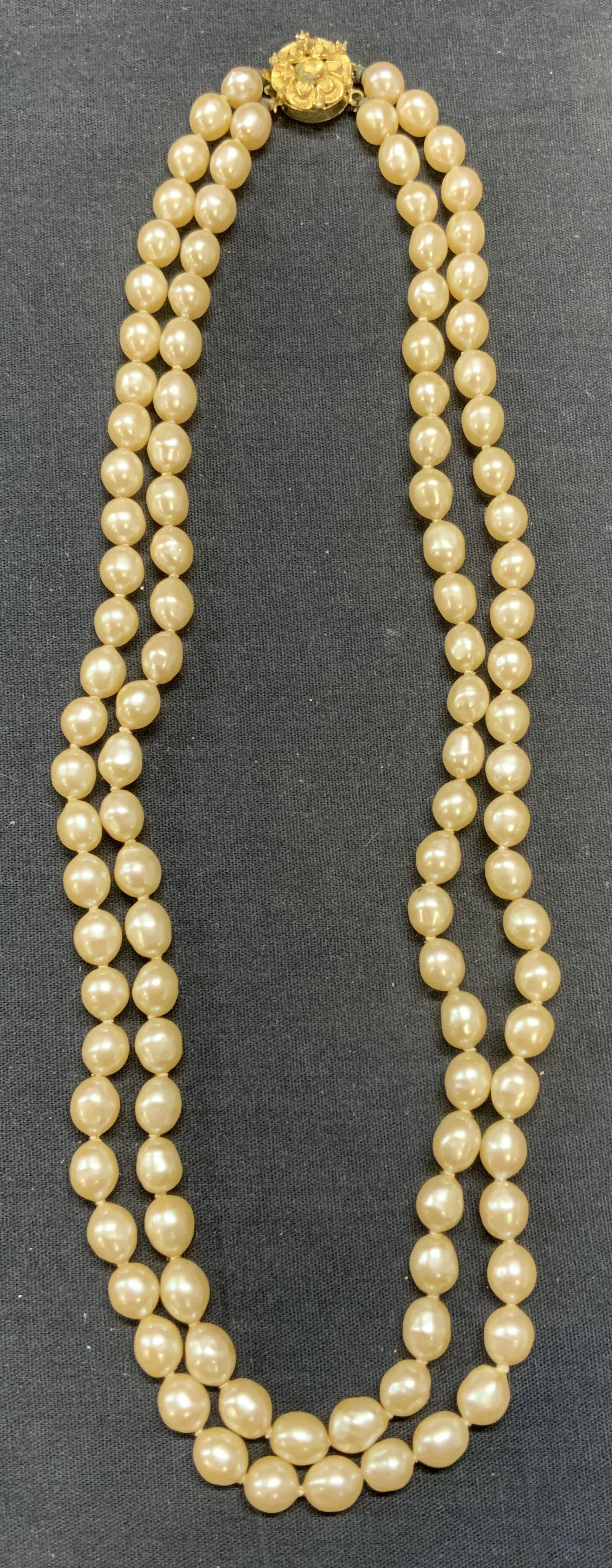 Vintage Double Strand Faux Pearl Necklace: Vintage double strand faux pearl beaded necklace on double knotted string with gold tone clasp. Drop length approx. 10 inches. Some surface wear including scratching observed. Estate jewelry, costume 