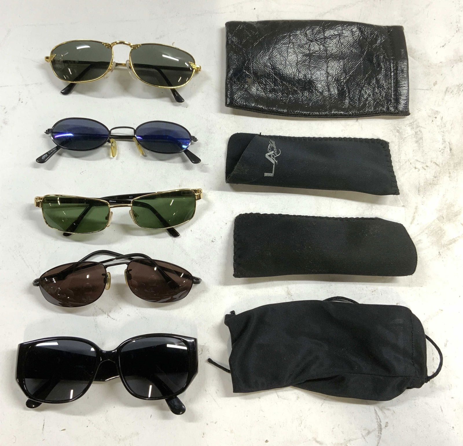 Lot 9 CHANEL Style Sunglasses & More: Lot includes 1 pair of sunglasses with CHANEL trademark, 2 pairs with gold toned framed & green toned lenses, 1 pair with black toned frame & blue lenses, 1 pair with black toned frame & brown lenses