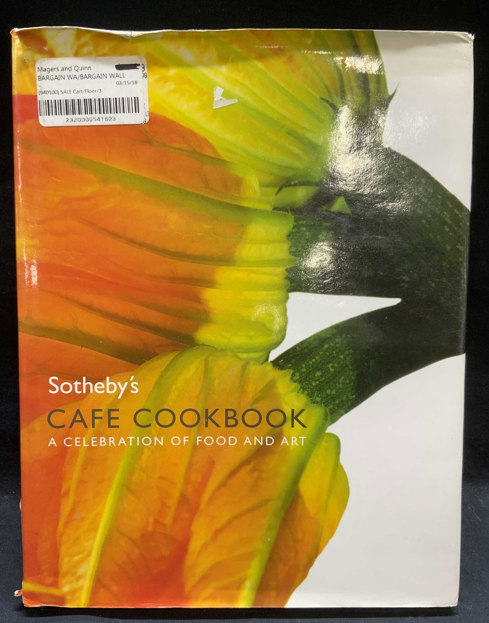 Sothebys Cafe Cookbook, Illustrated: Hardcover copy of Sothebys Cafe Cookbook with recipes by Laura Greenfield. Published by Sothebys, 2006. Measures approx. 11.25 x 8.75 inches. Some wear to cover, pages, and spine consistent with expos
