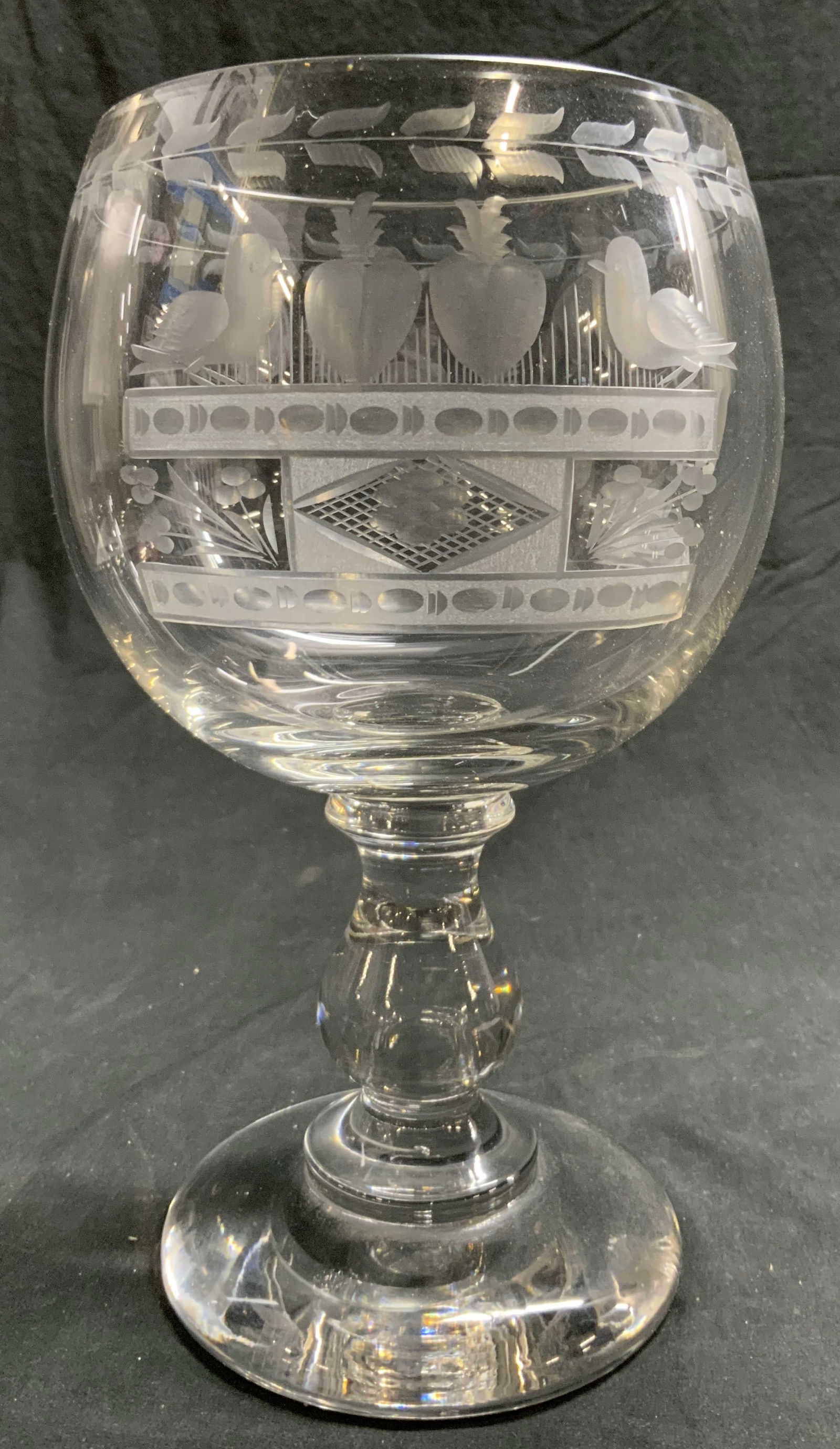 TOUJOURS FIDELE Crystal Goblet W Frosted Detail: Goblet is inscribed TOUJOURS FIDELE. Goblet is crystal. Piece has frosted vine, leaf, fruit, bird, and geometric detail. Vessel measures approximately 10 inches tall 6 inches wide. Goblet, crystal gob