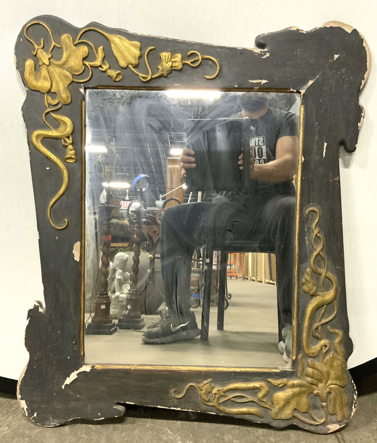 Vintage Carved Gilt Wood Wall Mirror 31in: Mirror is vintage and wooden. Frame is brown with gold toned beveled gilt floral & vine detail. Mirror measures approximately 31 inches tall 26 inches wide. Mirror, vintage mirror, wooden mirror, wood