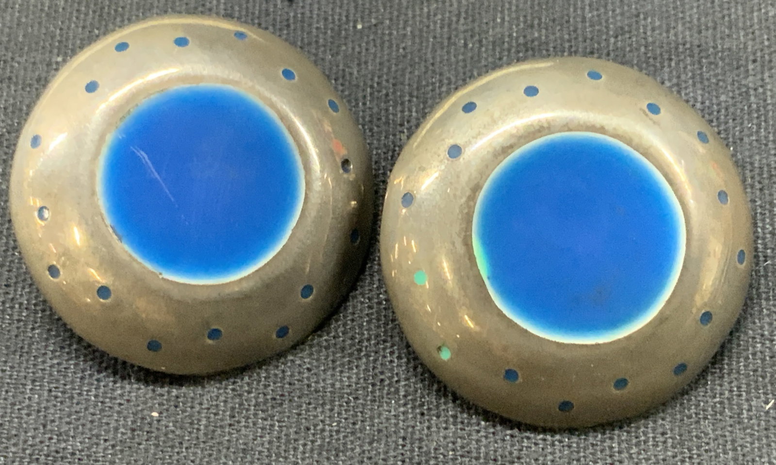 Pr Sterling Silver & Enamel Clip On Earrings Mexico: Pair of Mexican sterling silver earrings, marked Mexico, 825. Sterling silver button clip on earrings to blue enamel with blue speckles on outer edges, approx 1.25 inch diameter. Moderate wearing to s