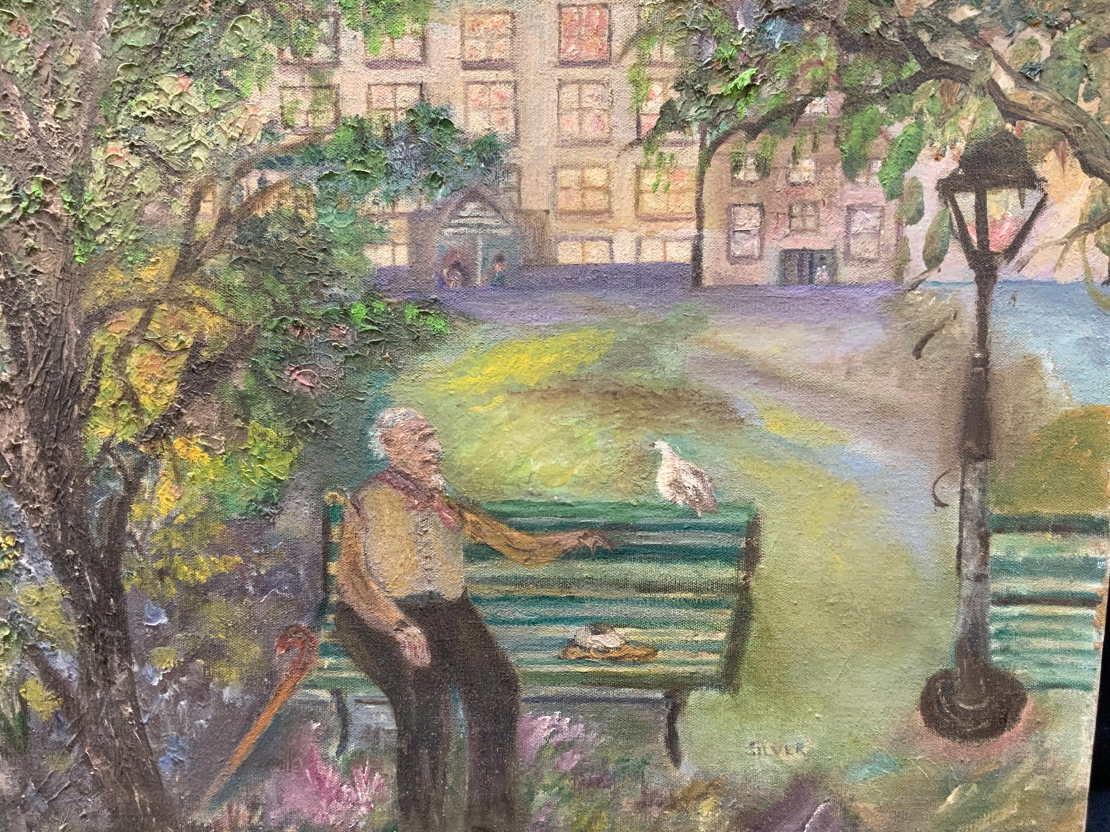 Silver Sgd Landscape Vtg Oil Painting: Signed silver on lower right corner. Depicts a landscape with a building in the background with a man seated on a bench in the foreground. No frame. Approx 16 x 20 inches. Evident wearing to the paint