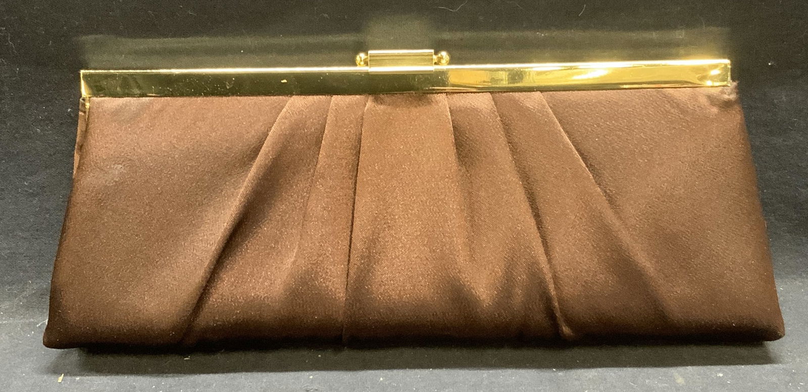 Jessica McClintock Brown Satin Evening Bag NWOT: Jessica McClintock brown satin evening bag with gold tone hardware and chain strap. Signed to interior. 1 slip pocket to interior. Push clasp closure. New without tag. Measures approx. 10.5 x 1.5 x 4