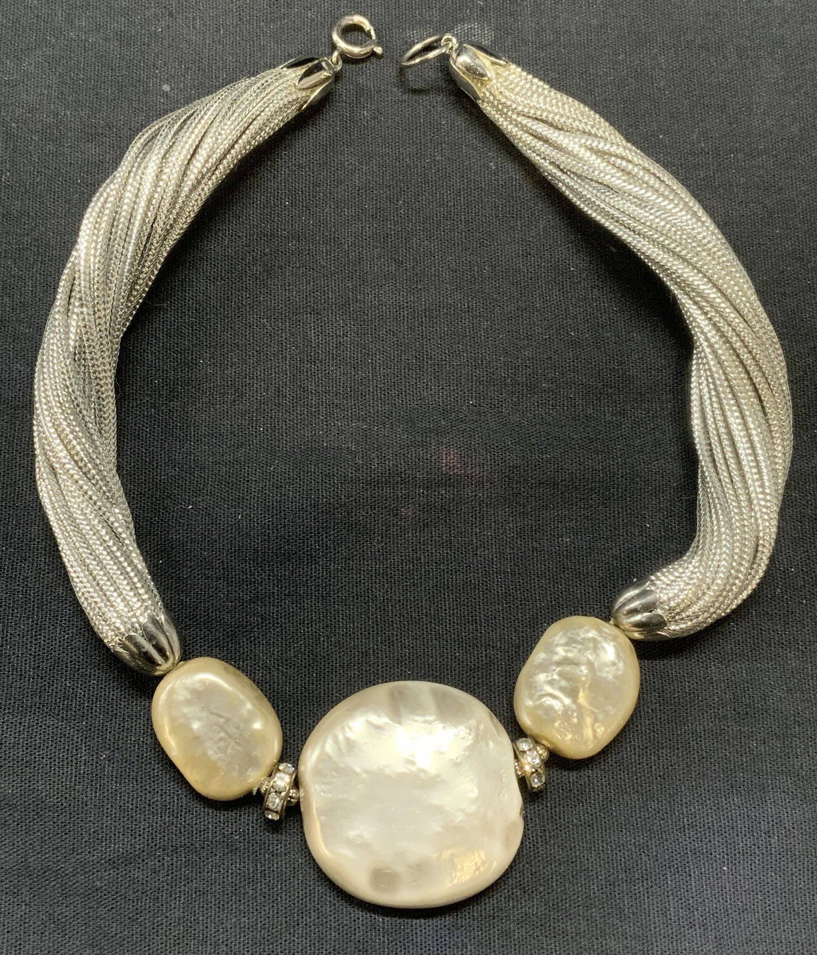 Silver Tone Faux Pearl Choker Necklace: Silver tone multi strand choker necklace with faux pearl stones. Drop length approx. 5 inches. Some surface wear including scratching observed. Estate jewelry, costume jewelry, cocktail jewelry, fashi