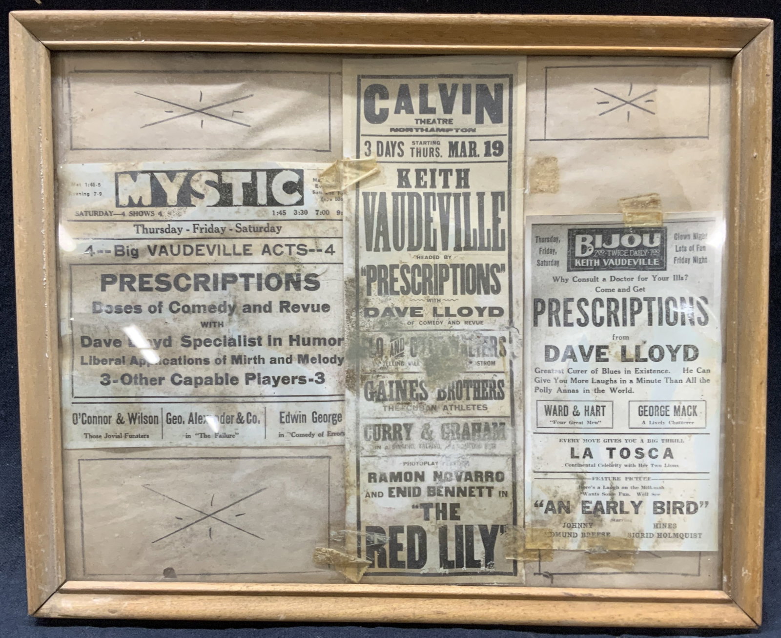 Famed Antique Vaudeville Newspaper Adverts: Framed vaudeville newspaper cut out adverts. Three reading Dave Lloyds show, titled, prescriptions, framed in a wooden frame. Approx 9 x 11 inches window measures 8 x 9.75 inches Evident blemishes to 