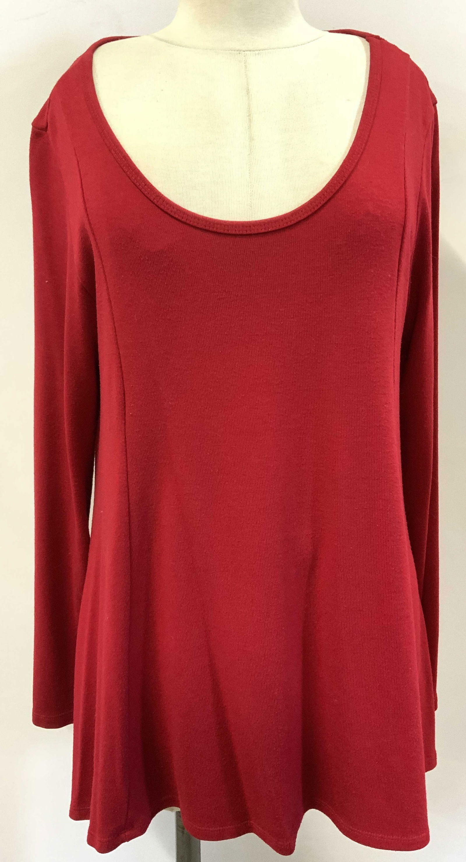 Joan Vass Flared Knit Top: Ladies vintage knit wear, long sleeve top with scoop neck and a flared body. Size large. Designer label affixed. Combination of polyester, rayon and spandex. Has some wear. 29 in. Long Ladies wearable