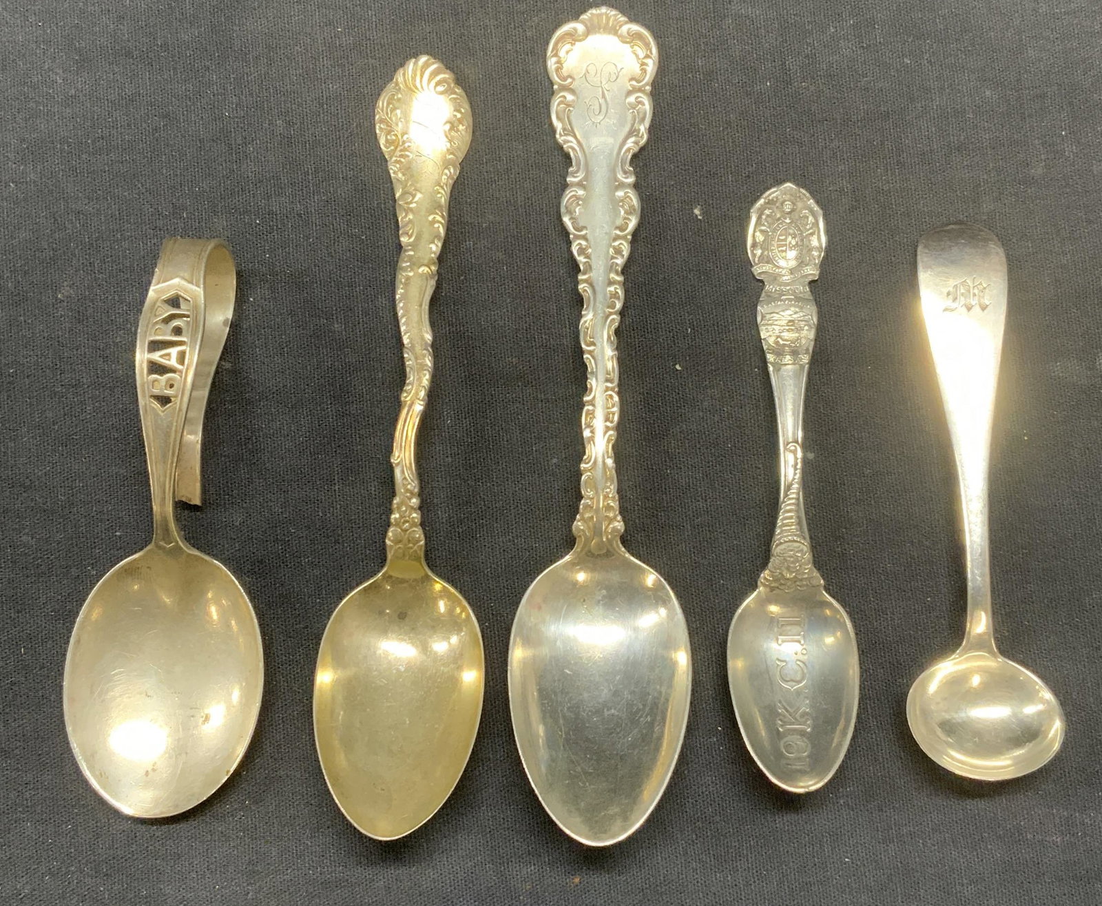 Lot 5 Antique & Vtg Sterling Silver Spoons: Lot of 5 antique and vintage sterling silver spoons. 4 pieces monogrammed, one reads Baby. All pieces marked sterling. Hallmarks include Muach & Adams, Biggelow Bros & Kennard, and more. Some hallmark