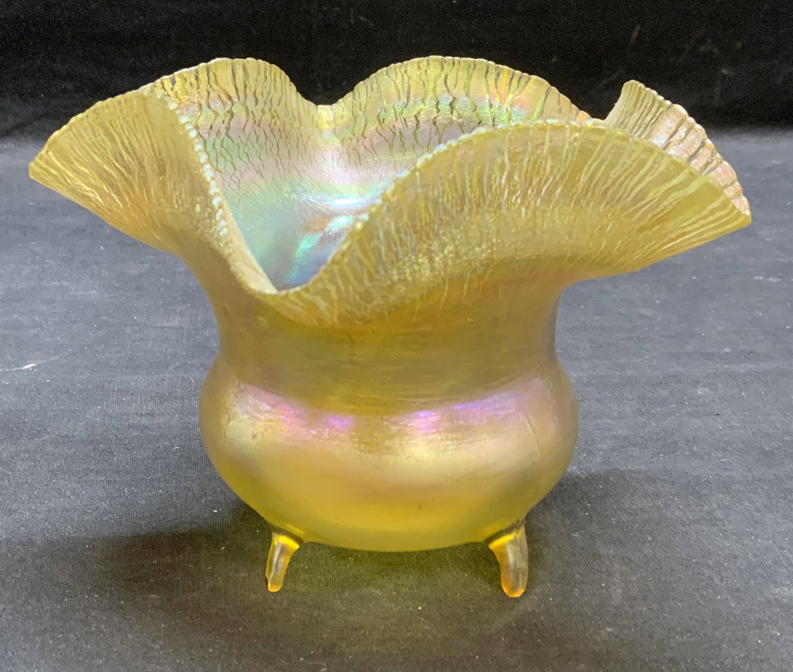 Antique LCT Tiffany Studios Favrile Glass Bowl: Antique Louis Comfort Tiffany Favrile glass bowl. Handblown gold toned art glass bowl with 4 feet to base and ruffled rim. Onion skin pattern. Signed L. C. T. To underside, numbered 436A. Measures app