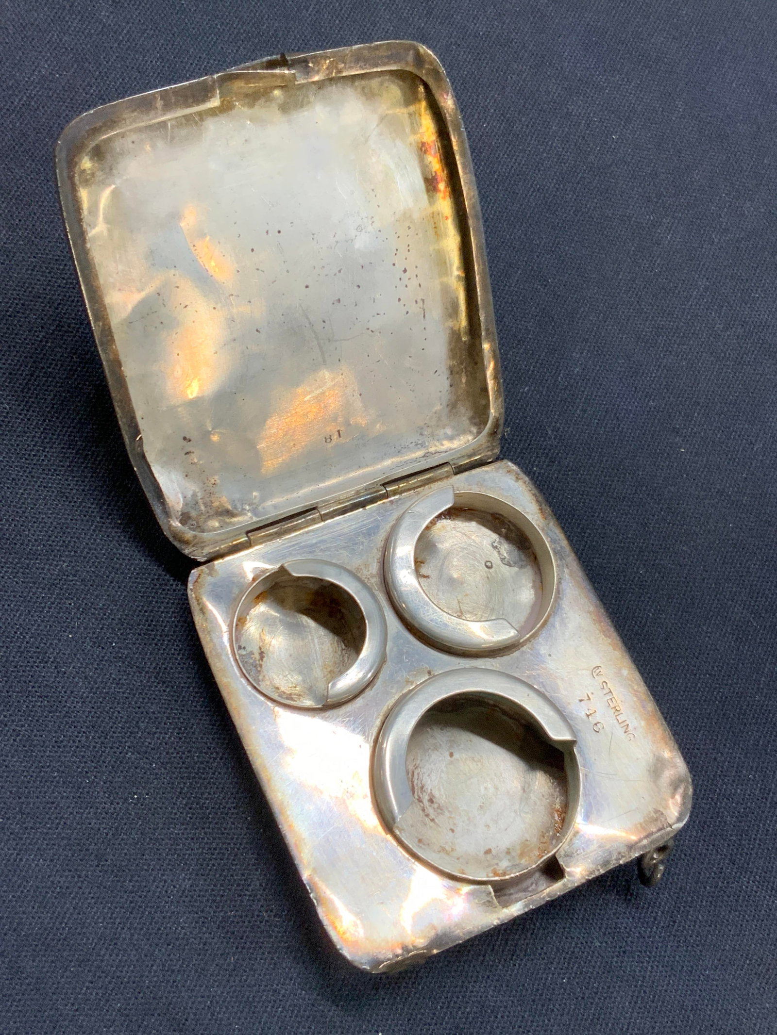 Vtg Sterling Silver Coin Purse Locket: Vintage coin locket, marked sterling, 746 on interior. A hinged topped coin purse made of sterling silver with three sections for coins on interior and etched on exterior with initials, EF on lid. App