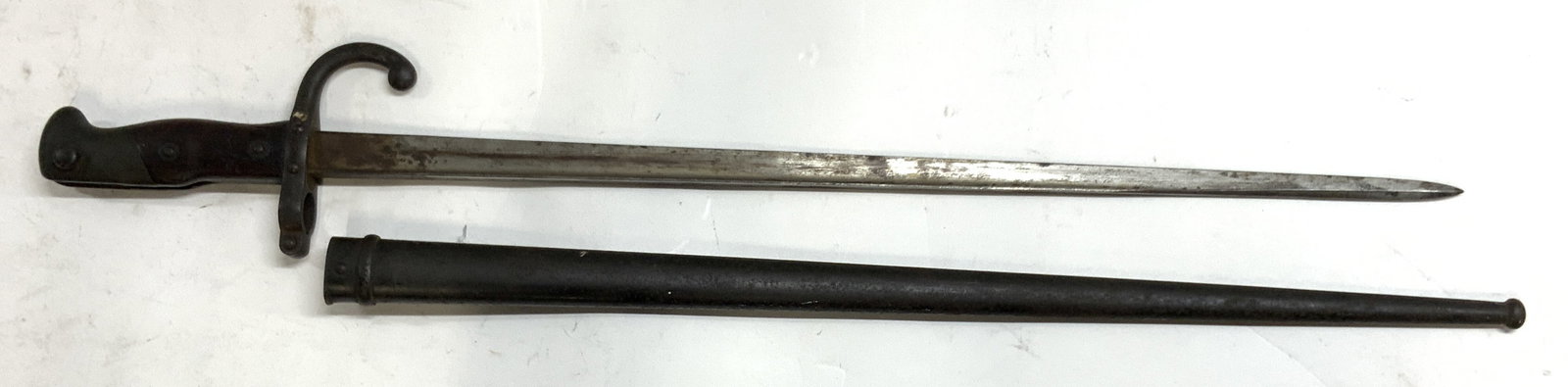 Antq 1800s Etched Rifle Bayonet W Scabbard: Antique signed rifle bayonet. Signed with a name and dated in the 1800s (see photos) Bayonet crafted with iron and steel for the blade, with iron and wooden Handle marked with numbers G 74153 and FH51