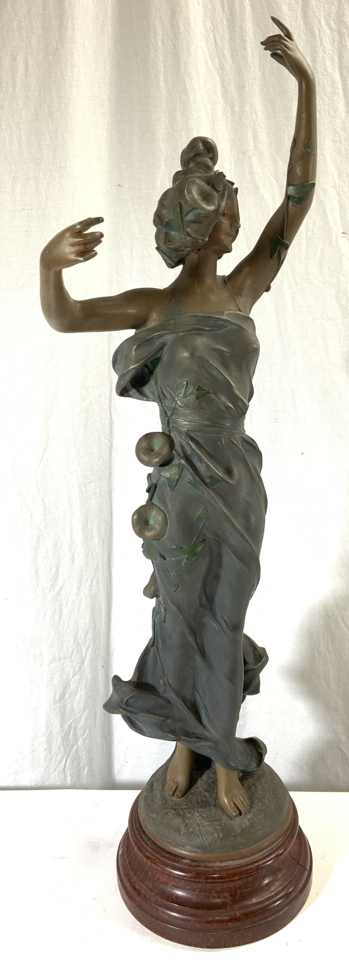 JULIEN CAUSSE LISERON Bronze Art Nouveau Sculpture: Sculpture is signed J CAUSSE. Plaque reads LISERON. Piece is gilt metal appears to be bronze. Sculpture depicts a female figure wearing a dress with floral, vine and leaf detail with arms raised. Base