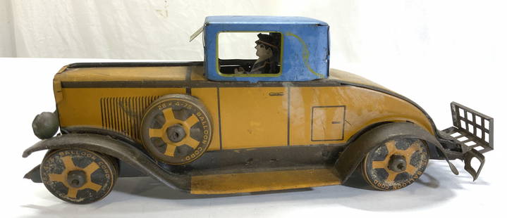 Antq Balloon Corp Toleware Marx Toy Car Model: LOUIS MARX Cadillac Coupe litho metal windup antique toy car, 12 in long. original mustard-yellow paint, blue cab . Wear and lighting of paint. Interior fitted with a lithographed driver, four metal t