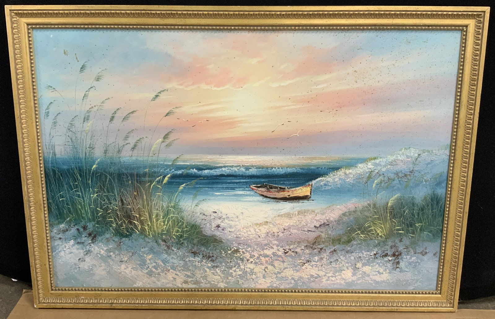 Sgd Beached Row Boat Landscape Oil Painting: Signed on lower right corner Illegibly Depicts a landscape of a beach during sunset with a row boat on the sand. Framed in a gold leafed braided edge wooden frame, approx 27 x 39 inches window measure